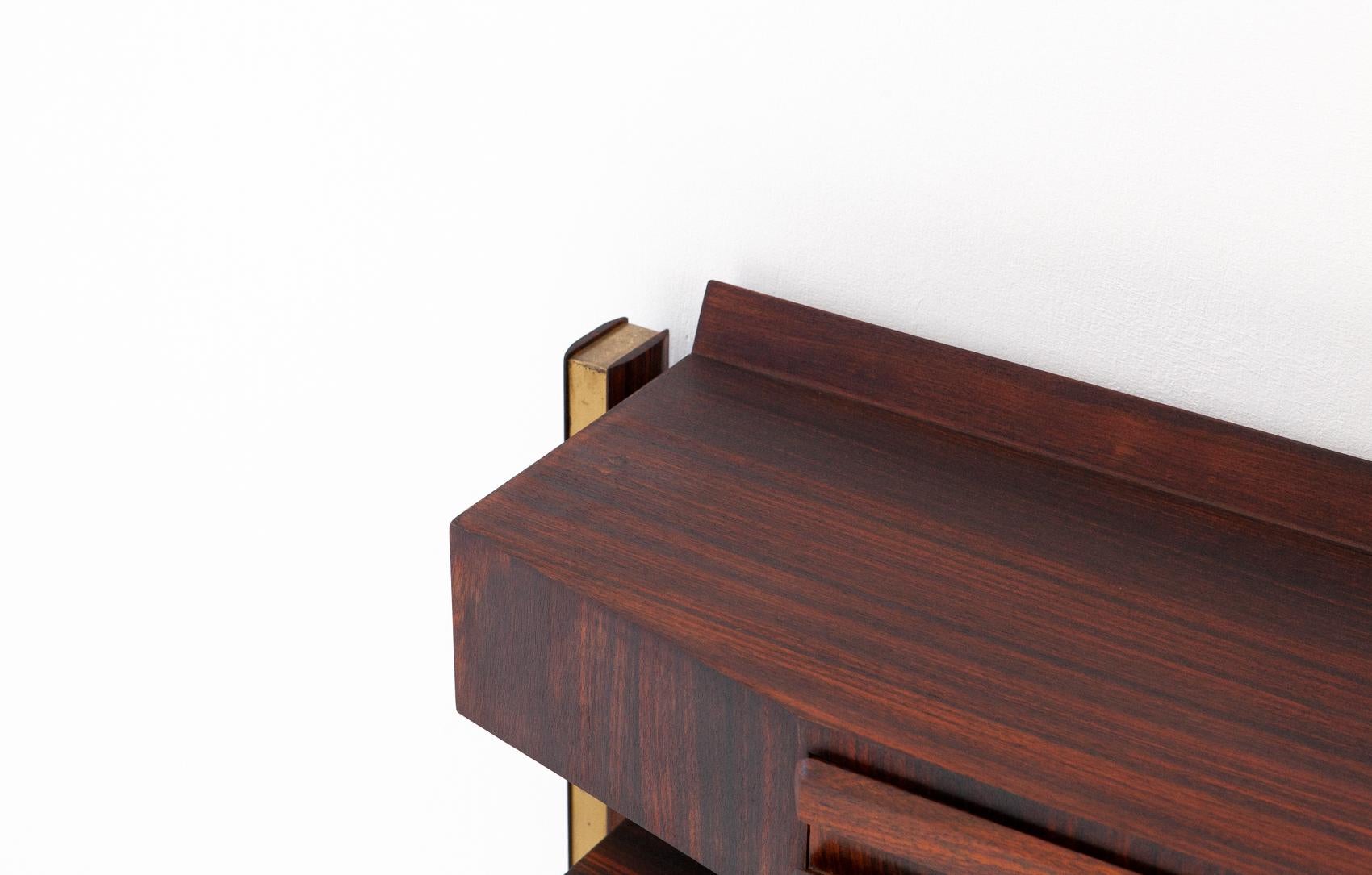 Italian modern console table in rosewood and brass.

Completely restored: As we normally prefer, the original finish has been completely removed to bring the wood back to its original state, then it has been finished with Japanese oil, this
