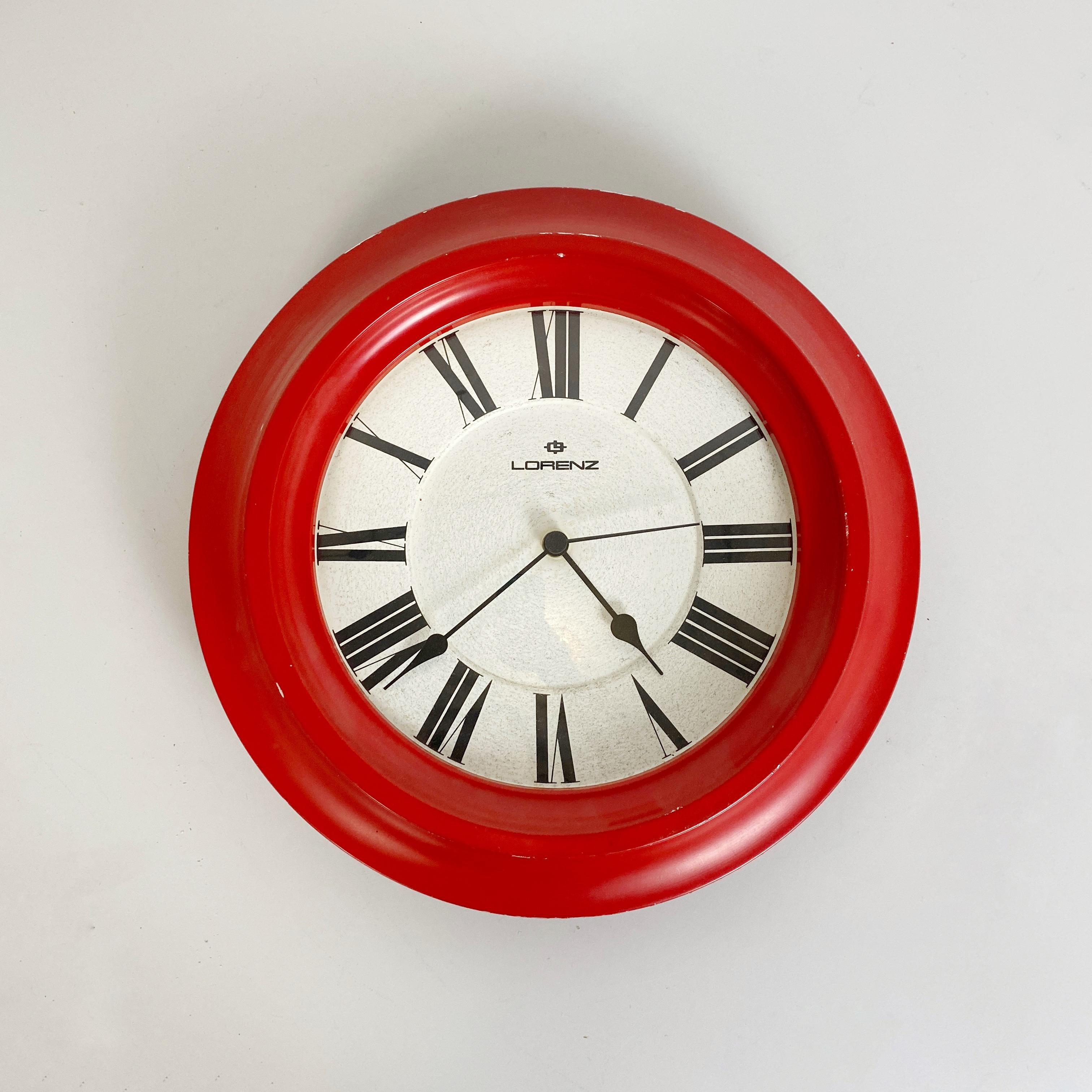 Italian Mid-Century Modern round red wall clock by Lorenz, 1970s
Round wall clock in red painted metal with white dial and black numbers. Made by Lorenaz in 1970 ca.
This is a perfect red touch for your house, kitchen or living.
We think can be a