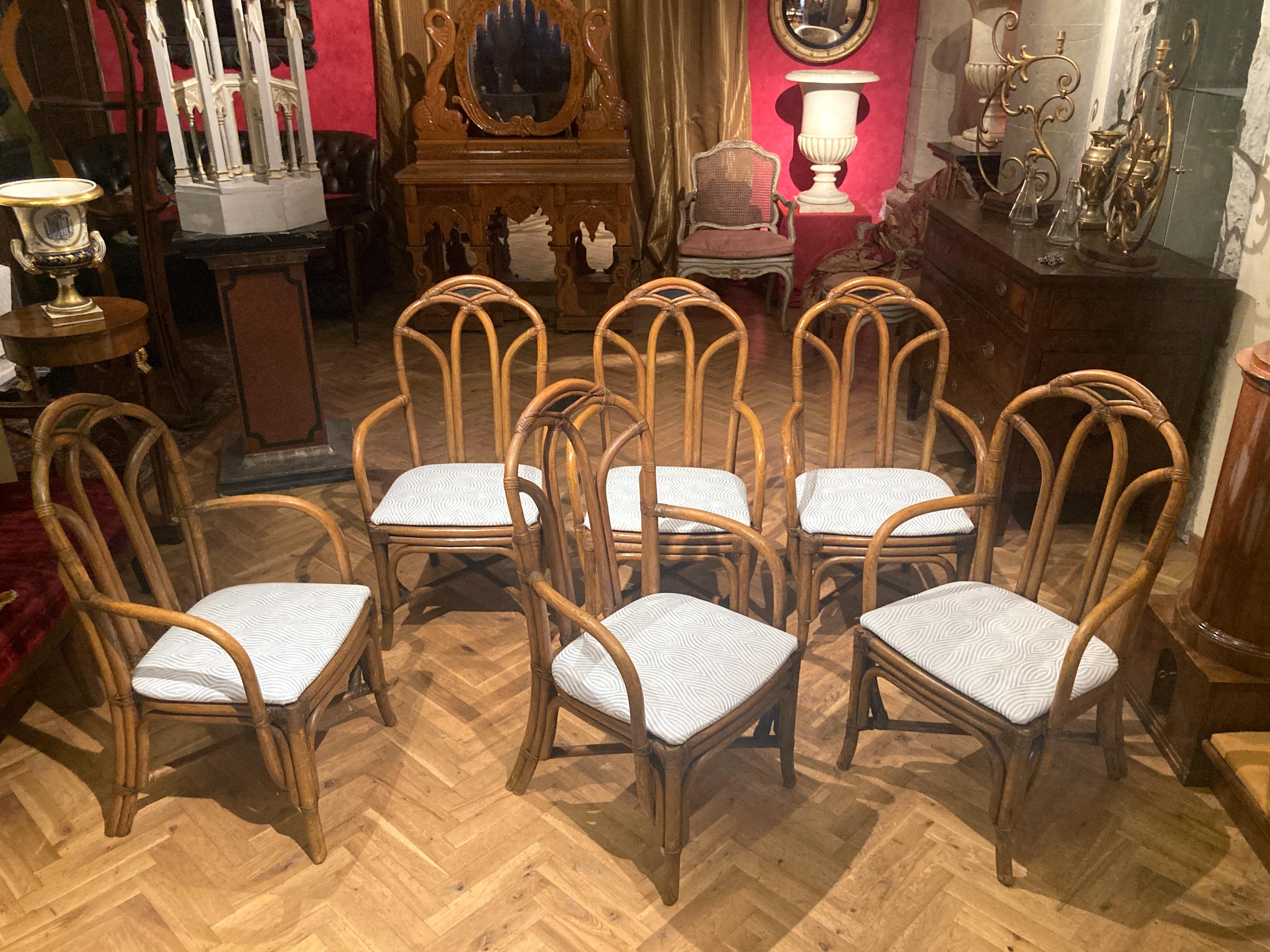 These six Italian Mid-Century Modern bamboo armchairs are a rare vintage set featuring great sculptural shape with a very nice intricate pattern and woven leather joints along with a gorgeous white and blue cotton upholstery.
Extremely well made