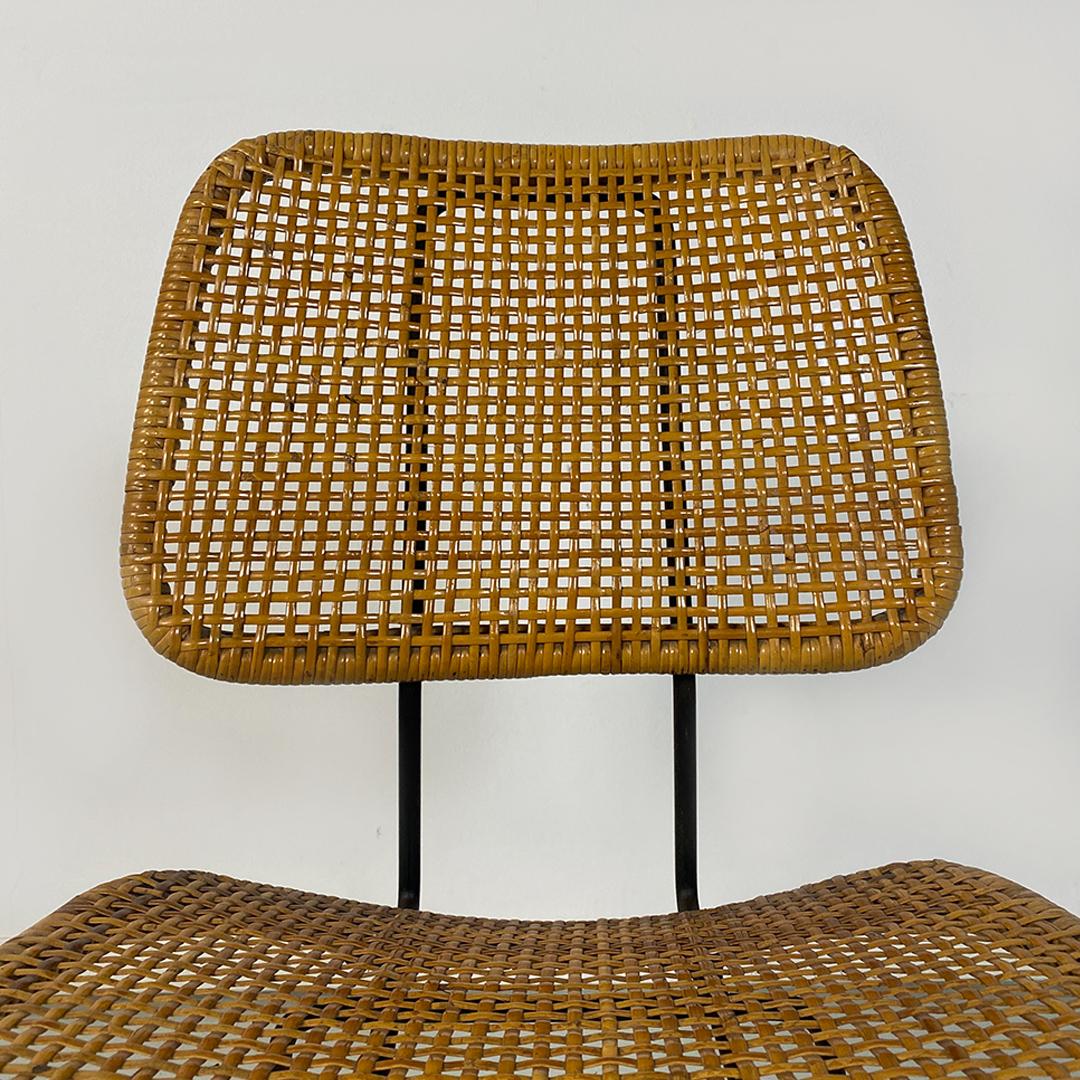 Italian mid century modern set of different wicker and black metal chairs 1960s For Sale 7
