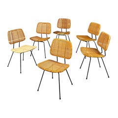 Italian mid century modern set of different wicker and black metal chairs 1960s