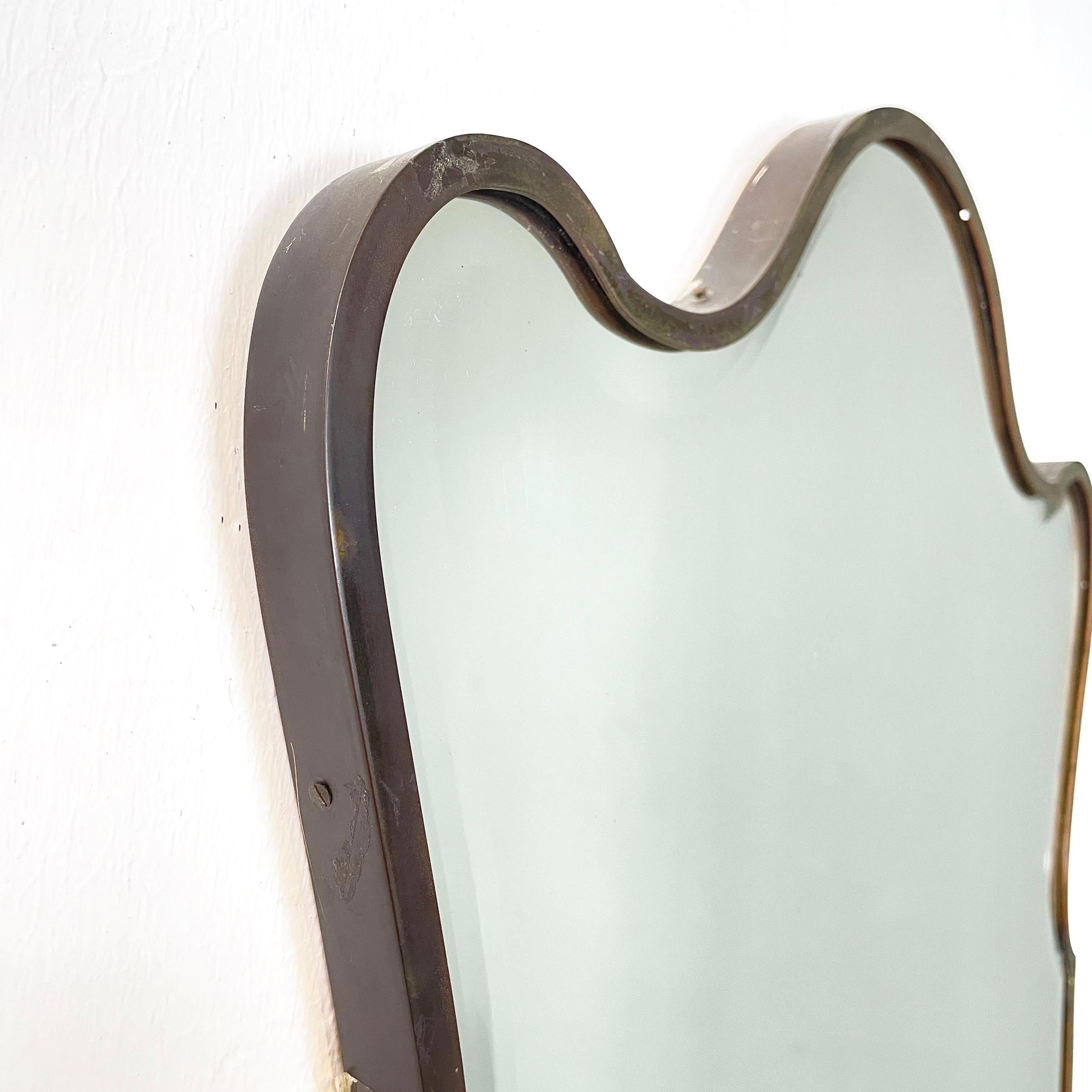 Metal Italian mid century modern Shaped wall mirror in dark metal frame, 1960s