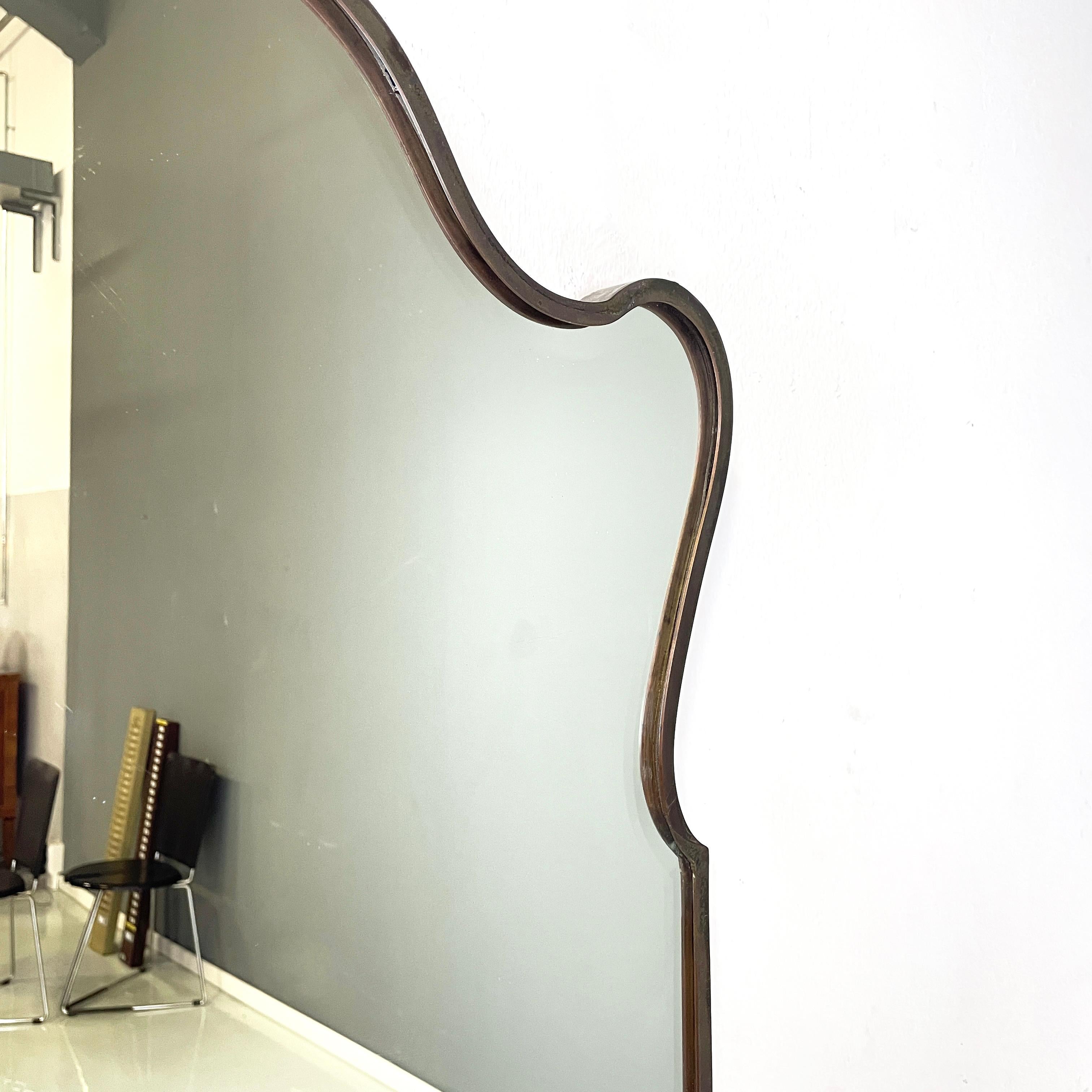 Italian mid century modern Shaped wall mirror in dark metal frame, 1960s 1