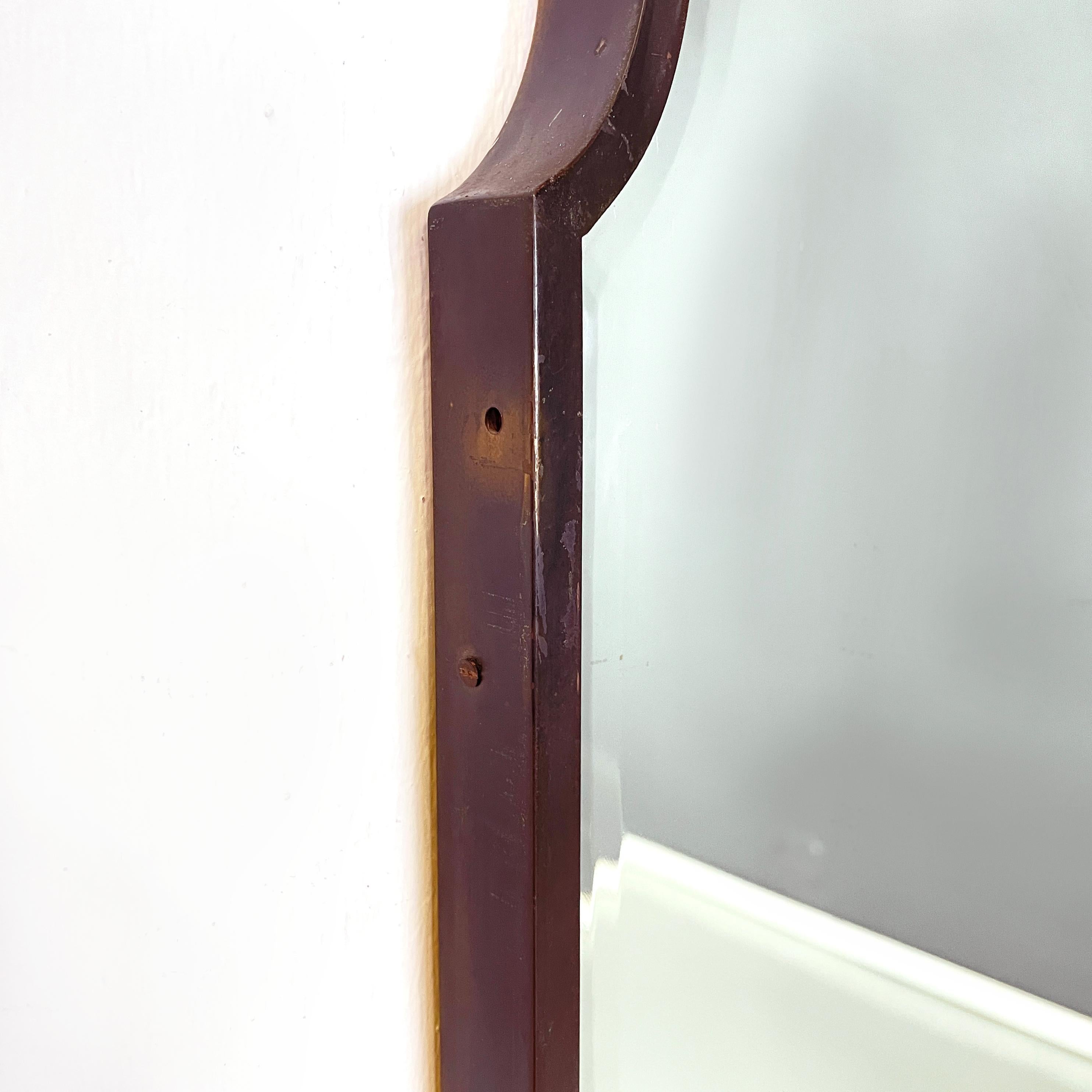 Italian mid century modern Shaped wall mirror in dark metal frame, 1960s 2