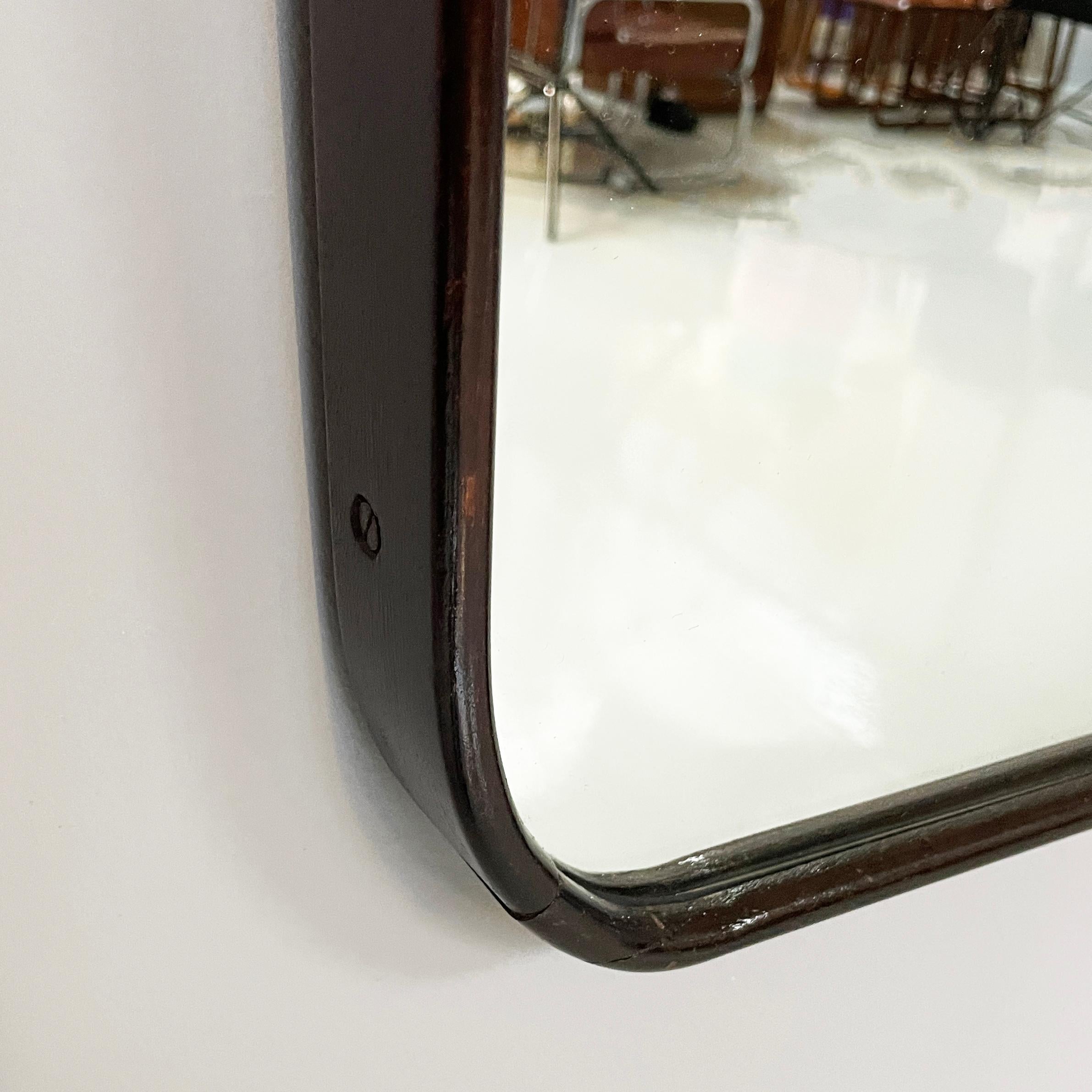 Specchio Italian mid-century modern shaped wall mirror in wood, 1940s in vendita