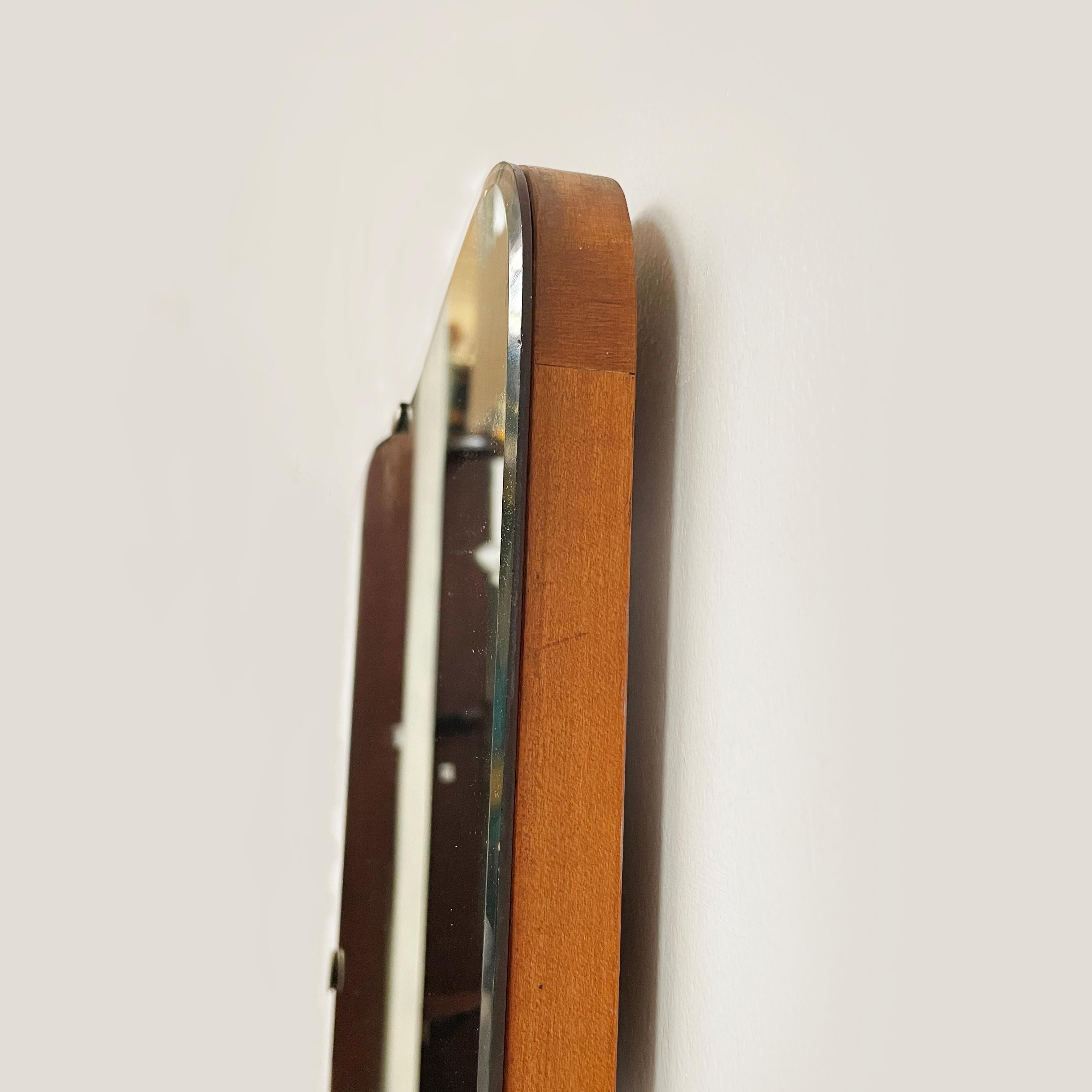 Italian mid-century modern Shaped wall mirror in wood and metal, 1950s 5