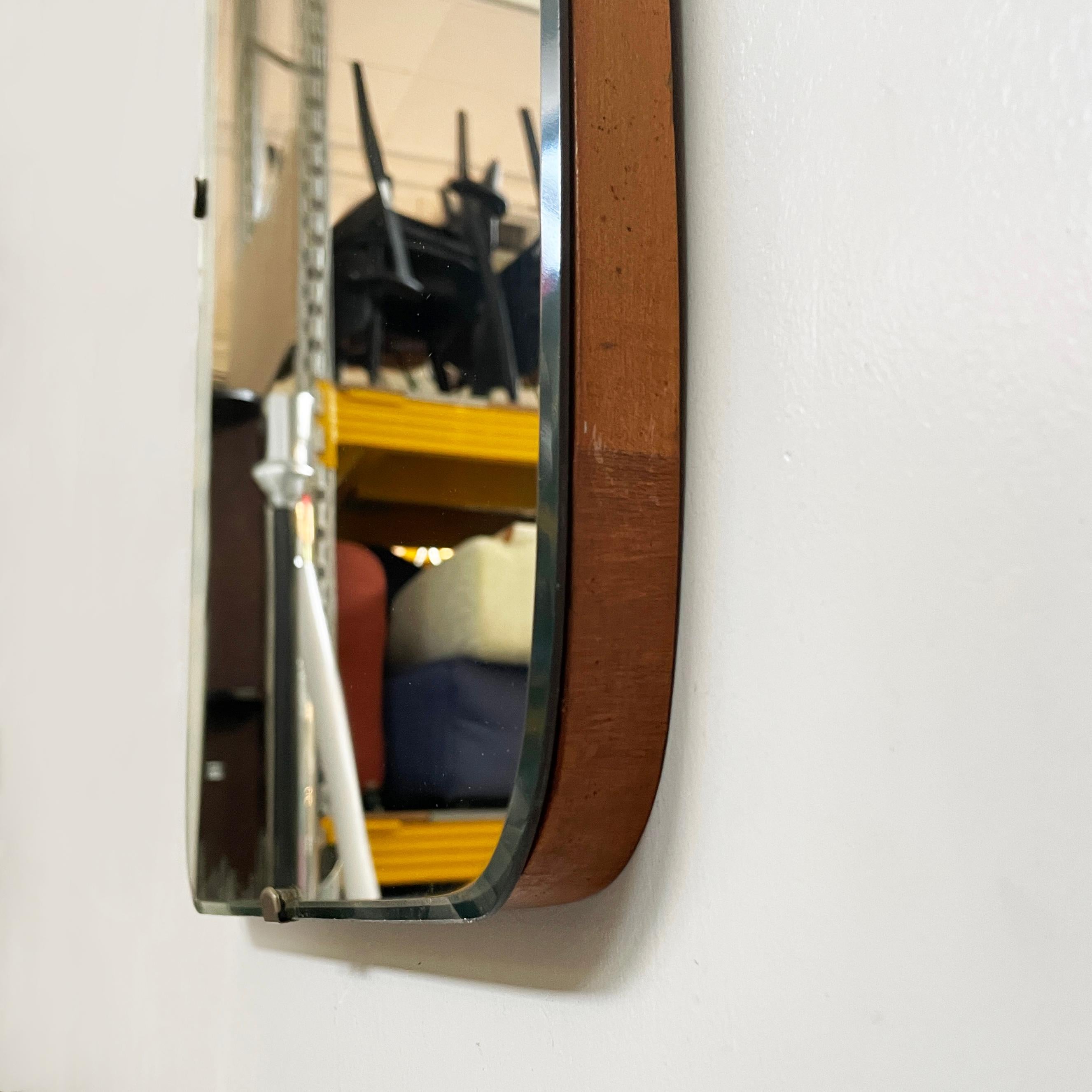 Italian mid-century modern Shaped wall mirror in wood and metal, 1950s 7