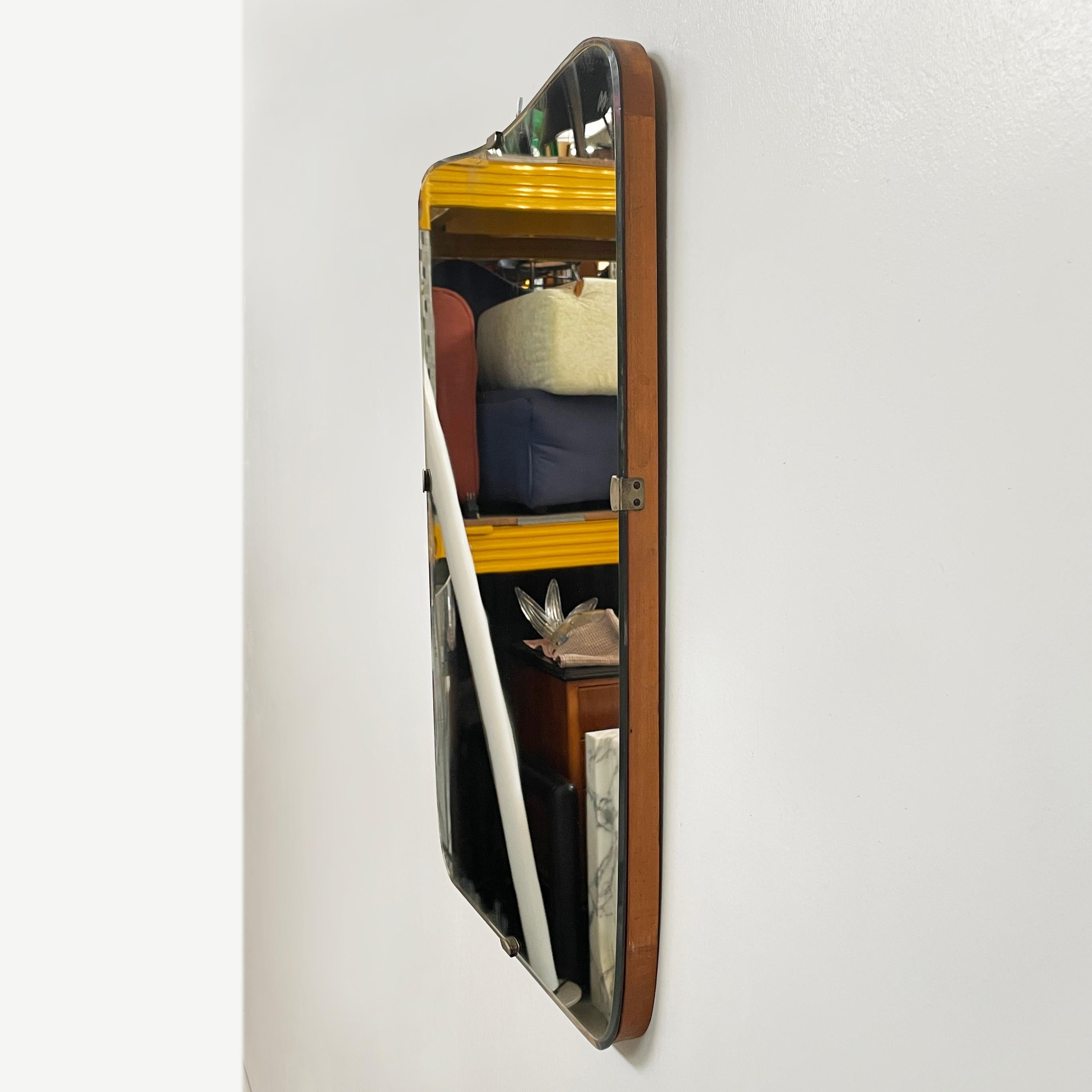 Mid-Century Modern Italian mid-century modern Shaped wall mirror in wood and metal, 1950s
