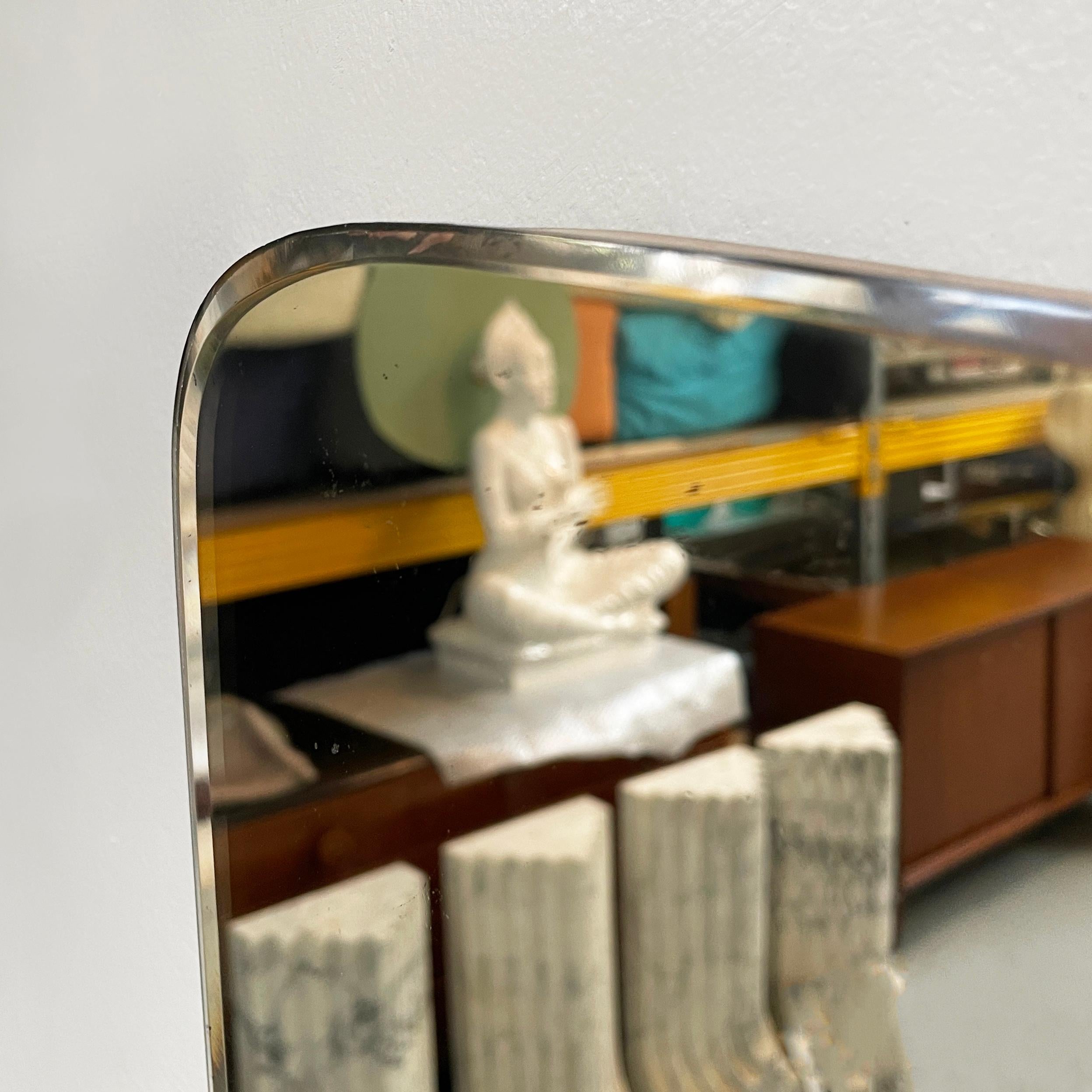 Italian mid-century modern Shaped wall mirror in wood and metal, 1950s 1