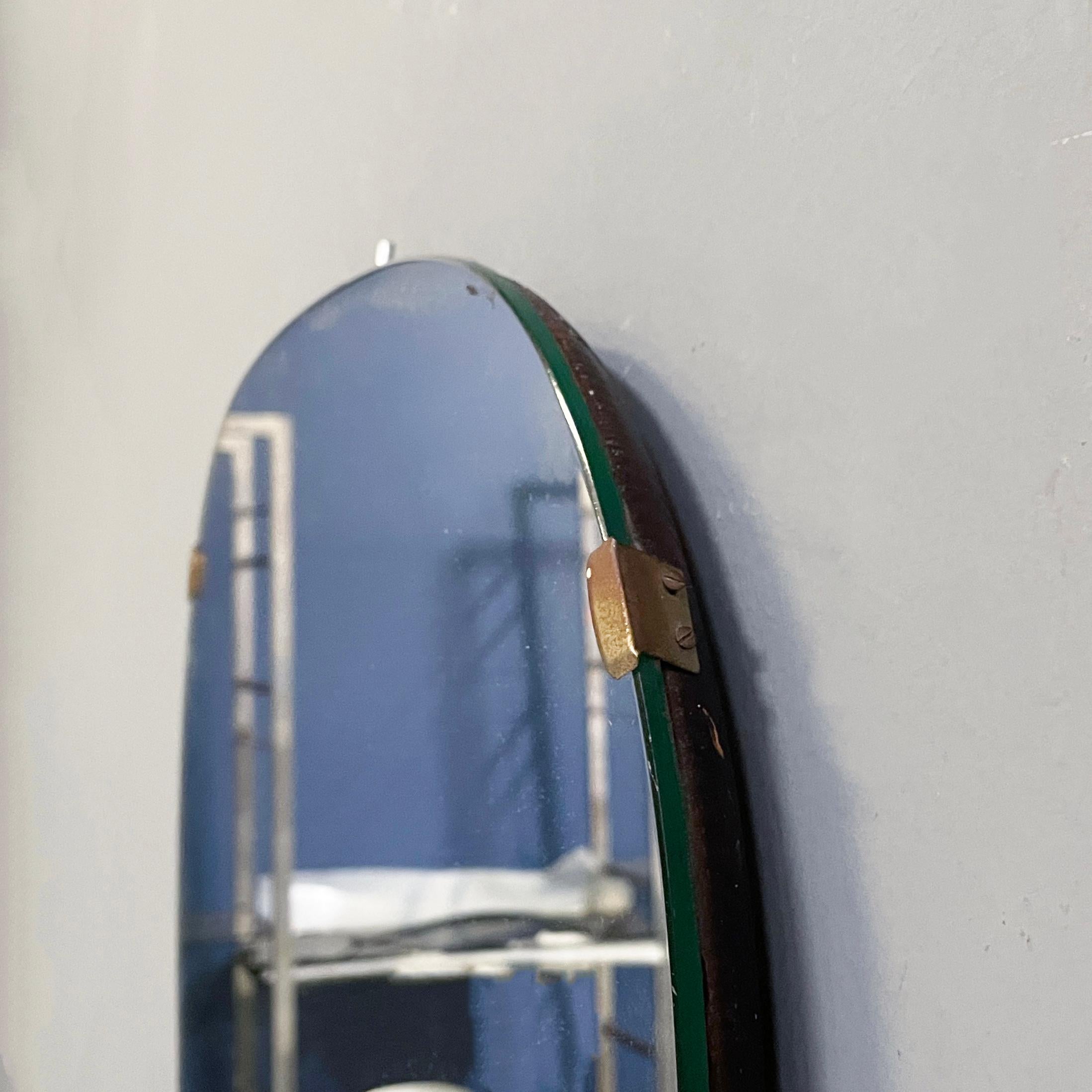 Italian mid-century modern Shield-shape wall mirror with brass details, 1960s For Sale 2