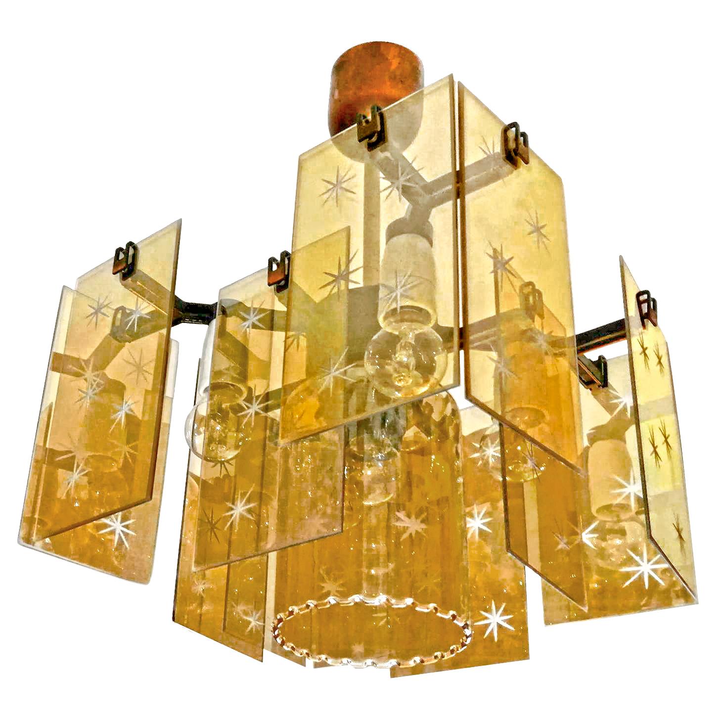 Gorgeous Italian modern Fontana Arte satellite chandelier with smoked amber gold wheel cut glass stars shades. Fabulous mirror effect. Brass with copper finish.
Dimensions:
Width 12.20 in / 31 cm
Diagonal 16,14 in / 41 cm
Height 19.29 in / 49