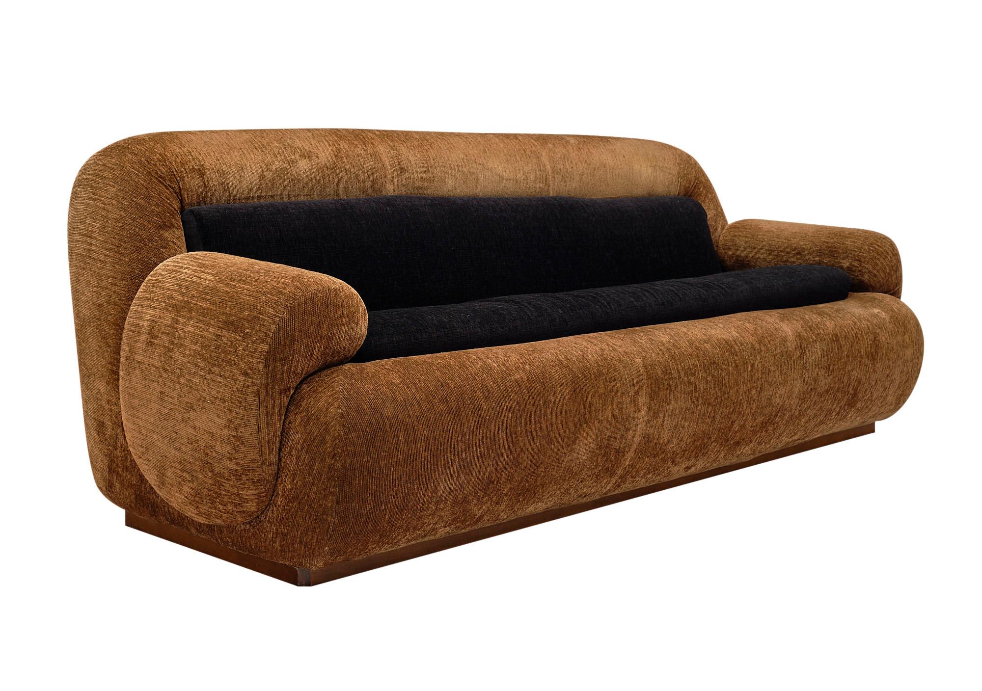 Sofa, Mid-Century Modern, from Italy with brown and black corduroy upholstery. This piece is in the style of Mario Bellini and is extremely comfortable. It is supported by a walnut base.