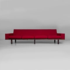 Italian mid-century modern sofa in red fabric and wood, 1960s