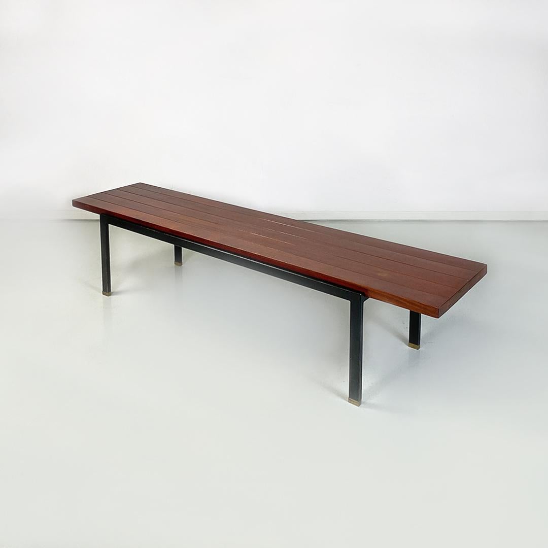 Italian mid century modern solid wood, black metal and brass medium size bench, 1960s.
Very simple bench with medium-sized structure, seat in solid wood and rectangular section legs in black metal, with brass tip.
1960s
Good state of