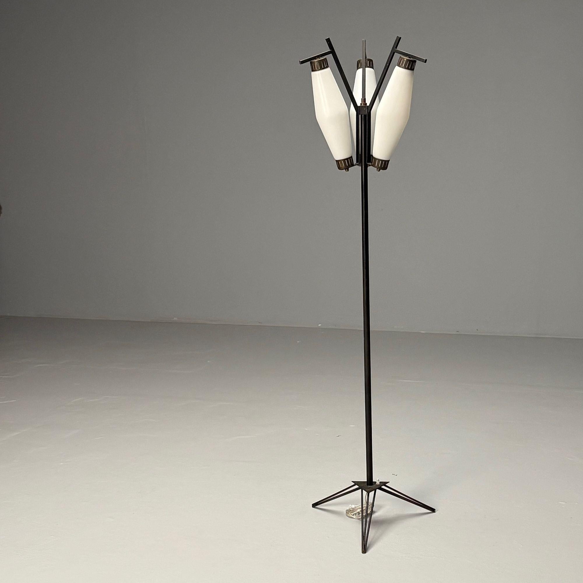 Italian Mid-Century Modern, Standing Floor Lamp, Painted Steel, Brass, Glass

This striking industrial-style floor lamp, crafted by an unknown Italian designer in the 1960s, features a bold and functional aesthetic. The lamp is constructed with a