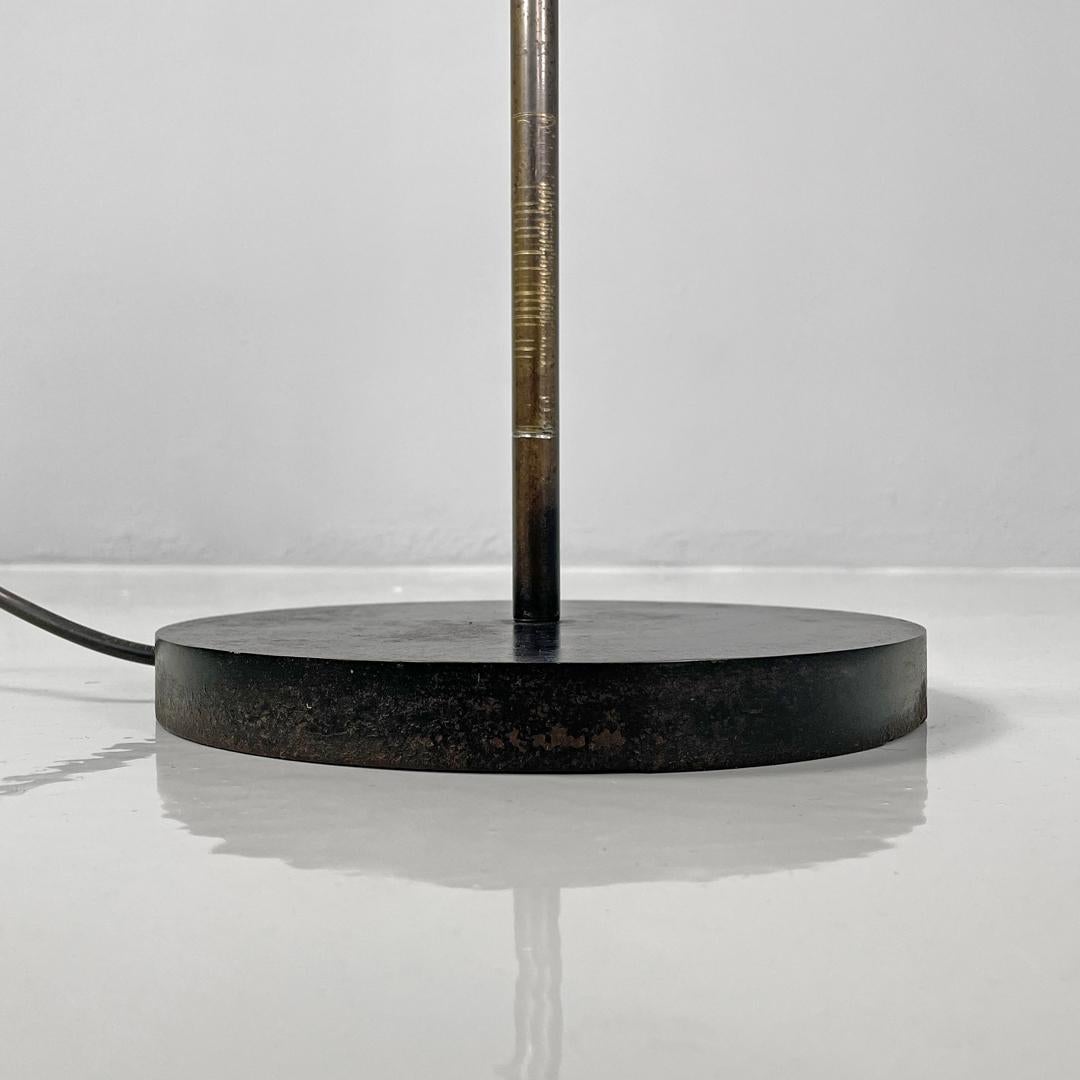 Italian mid-century modern steel floor lamp with black round base, 1950s For Sale 9