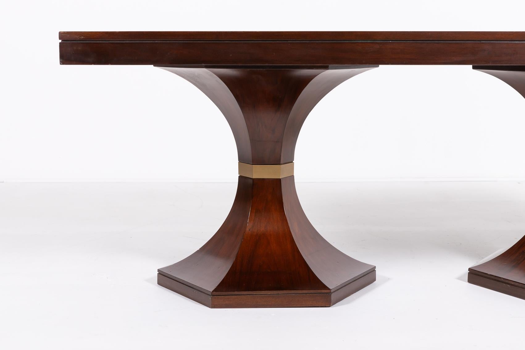 Italian Mid-Century Modern rectangular table from Carlo de Carli, 1960’s. It has a lacquered walnut finish with brass decor elements in the middle of the legs.

Condition
Good, usage marks

Dimensions
depth: 100 cm
width: 198,5 cm
height: 76 cm