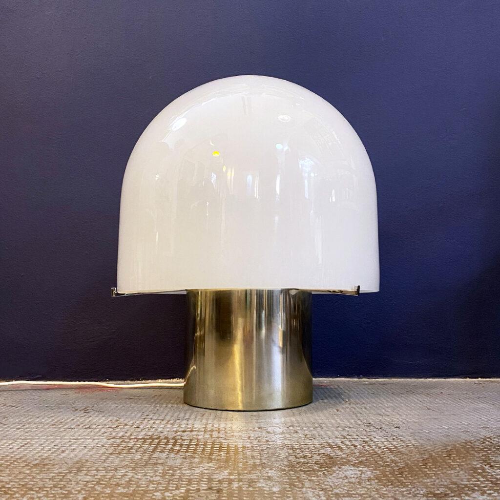 Italian Mid-Century Modern table lamp with glossy opal glass by Mazzega, 1970s.
Chromed table lamp with cylindrical base in chromed steel and dome-shaped lampshade in glossy opal glass.
Produced by Mazzega.

Good conditions

Measures: 45 x 55