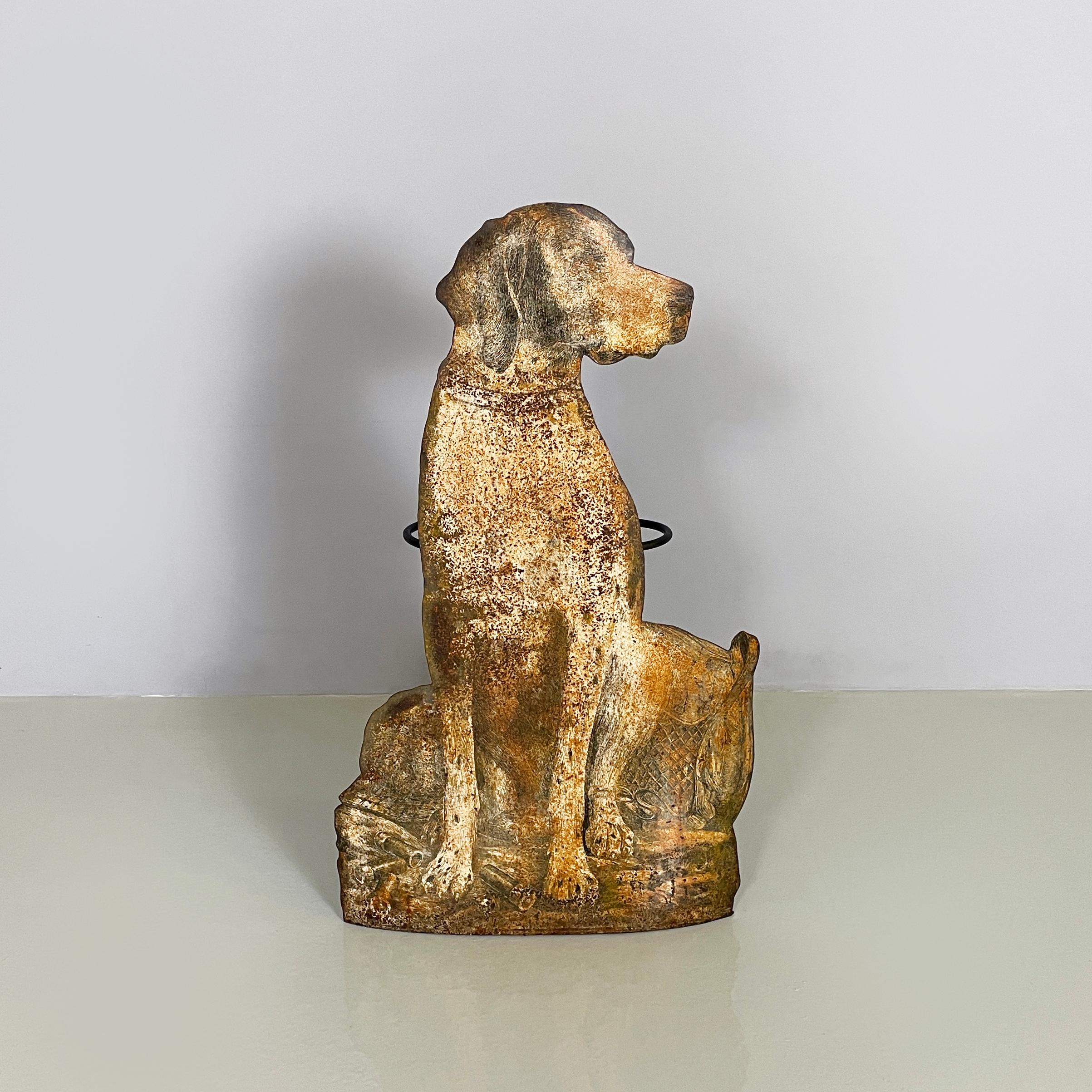 Italian mid-century modern Umbrella stand with dog by Fornasetti, 1950s
Metal umbrella stand. On the front there is a shaped and painted metal sheet: the subject is a dog sitting on a drapery with small objects scattered around. On the back there is