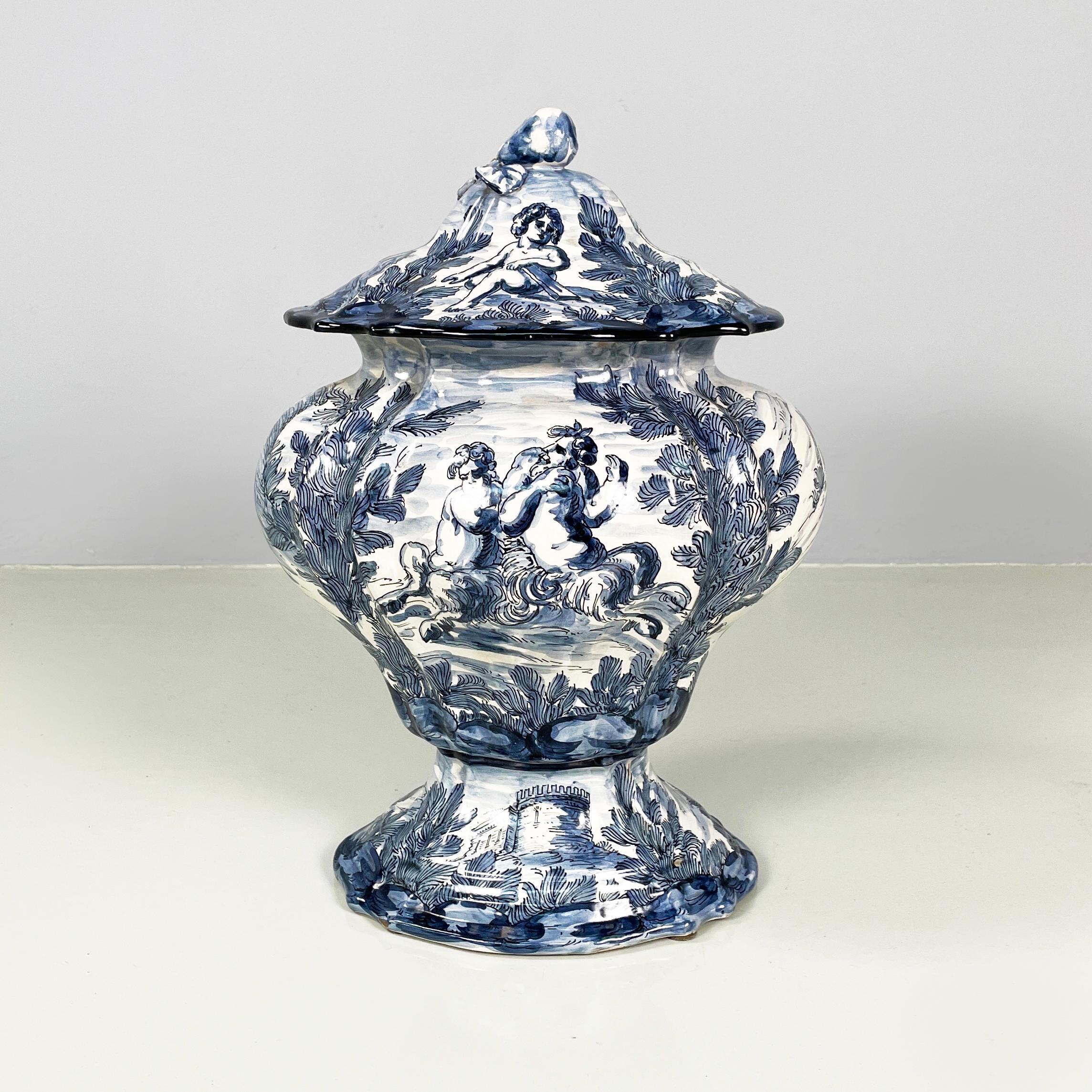 Italian mid-century modern Vase in white and blue ceramic, 1900-1950s
Vase with lid entirely in white ceramic with blue designs. The subjects portrayed are of bucolic inspiration with floral decorations. The lid handle is pear-shaped. Finely