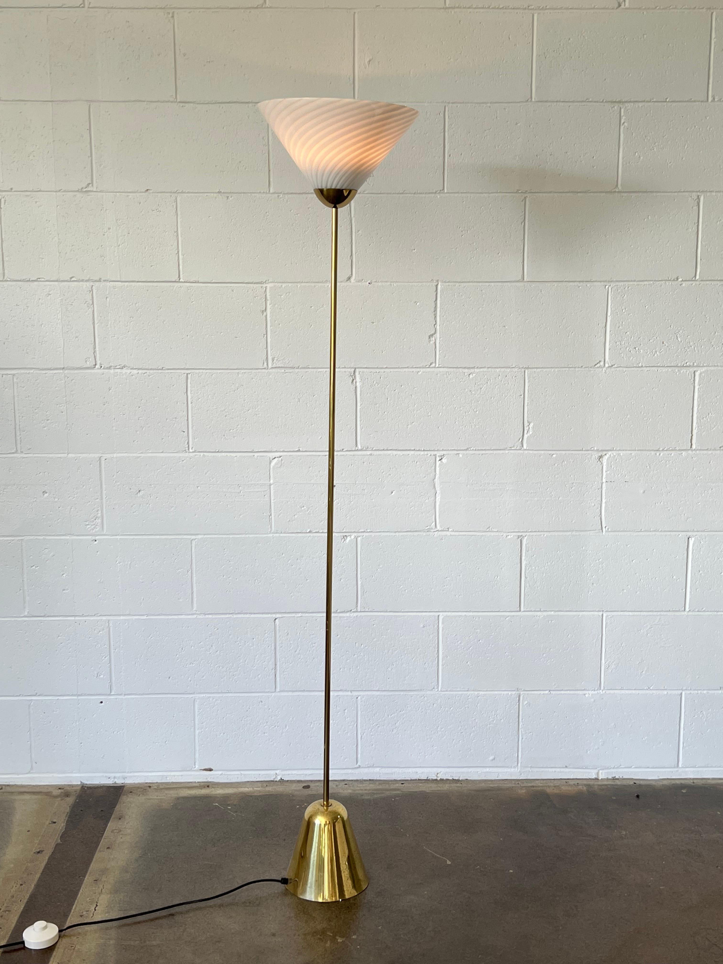 Stunning floor lamp by Venini 1960s
Glass cone shaped shade and brass base.
  
