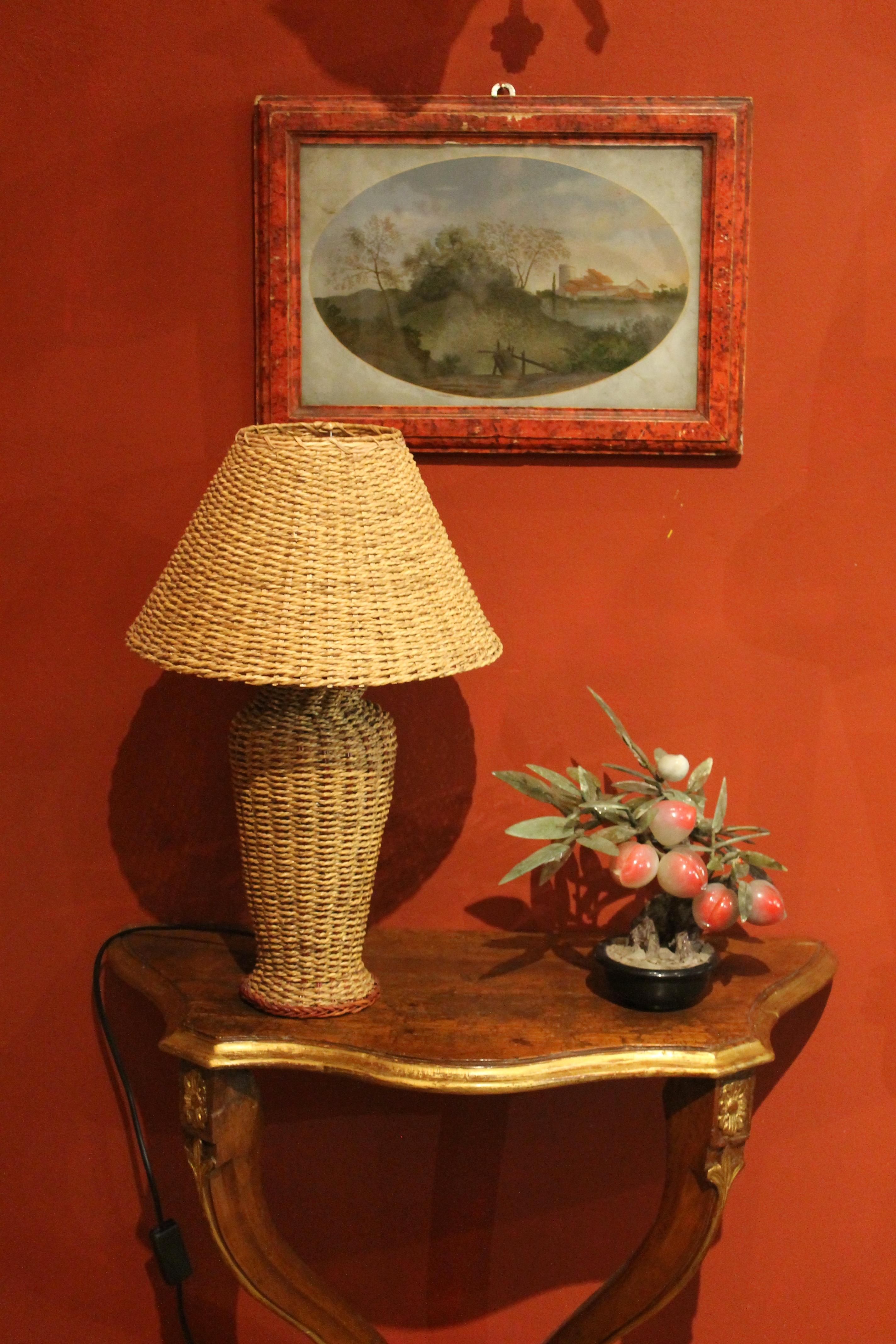 These Italian laced wicker table lamps date to the 1970s. Stylish and chic these unusual light fixtures give value to a natural and universal material, straw or woven cane so much used and loved by Mediterranean peoples.
The wicker, also known as