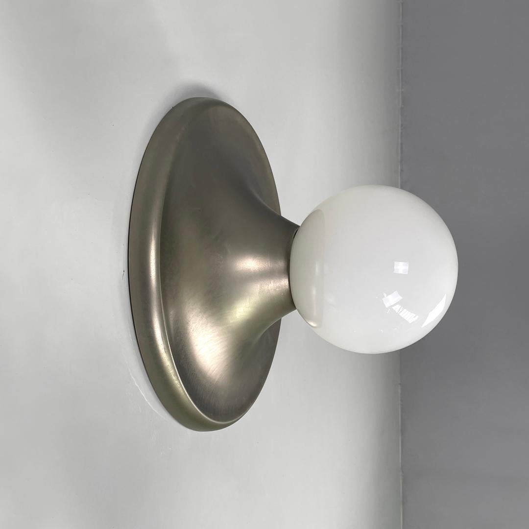 Italian mid-century modern matte metal wall lamp Light Ball by Achille and Pier Giacomo Castiglioni  for Flos, 1960s
Wall or ceiling lamp model Light Ball with spherical diffuser in opaline glass. The round-based structure is matte metal.
Produced