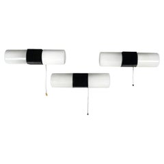 Italian mid-century modern Wall lamps in opaline glass and black Bakelite, 1950s