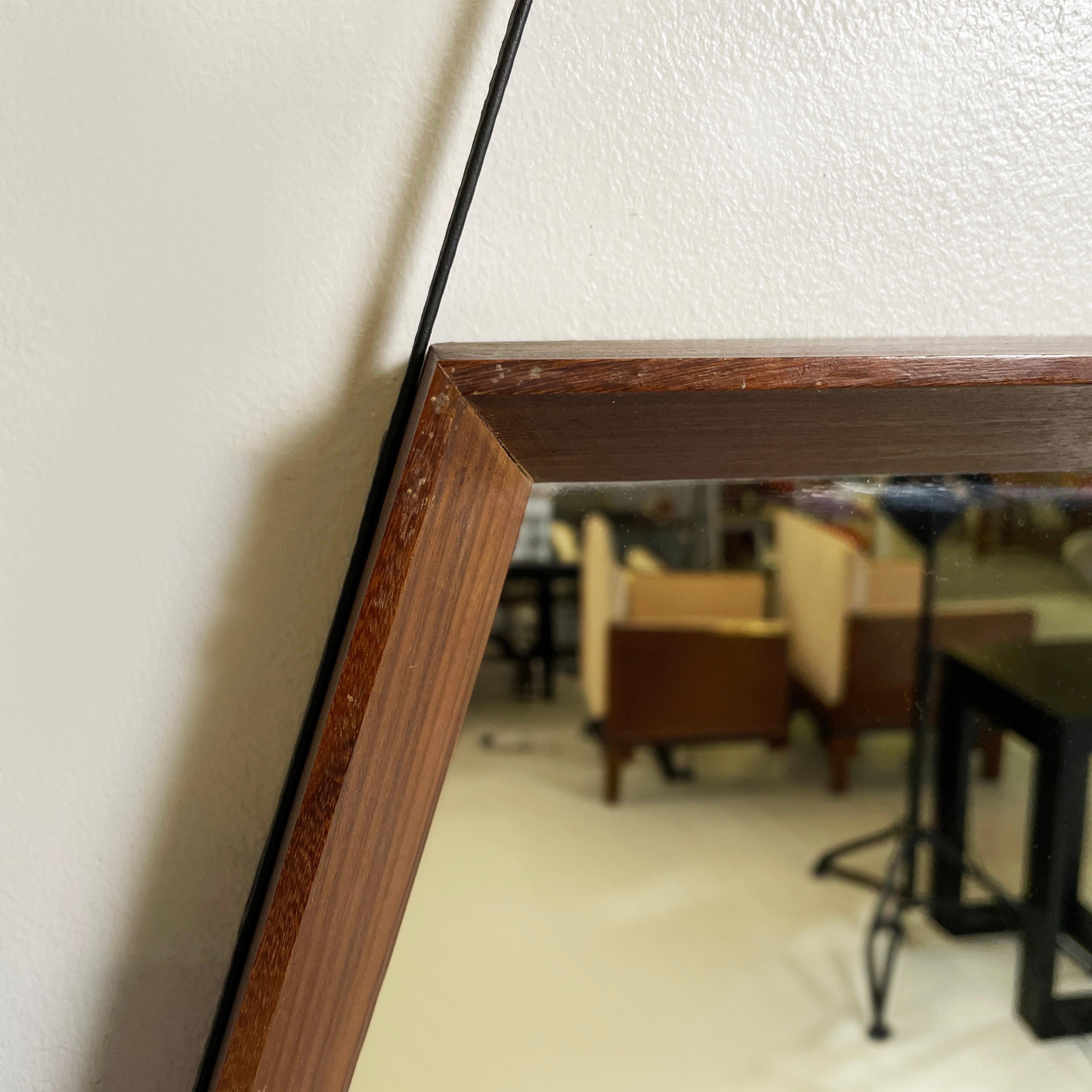 Mid-20th Century Italian mid-century modern Wall mirror in wood and black leather, 1960s For Sale