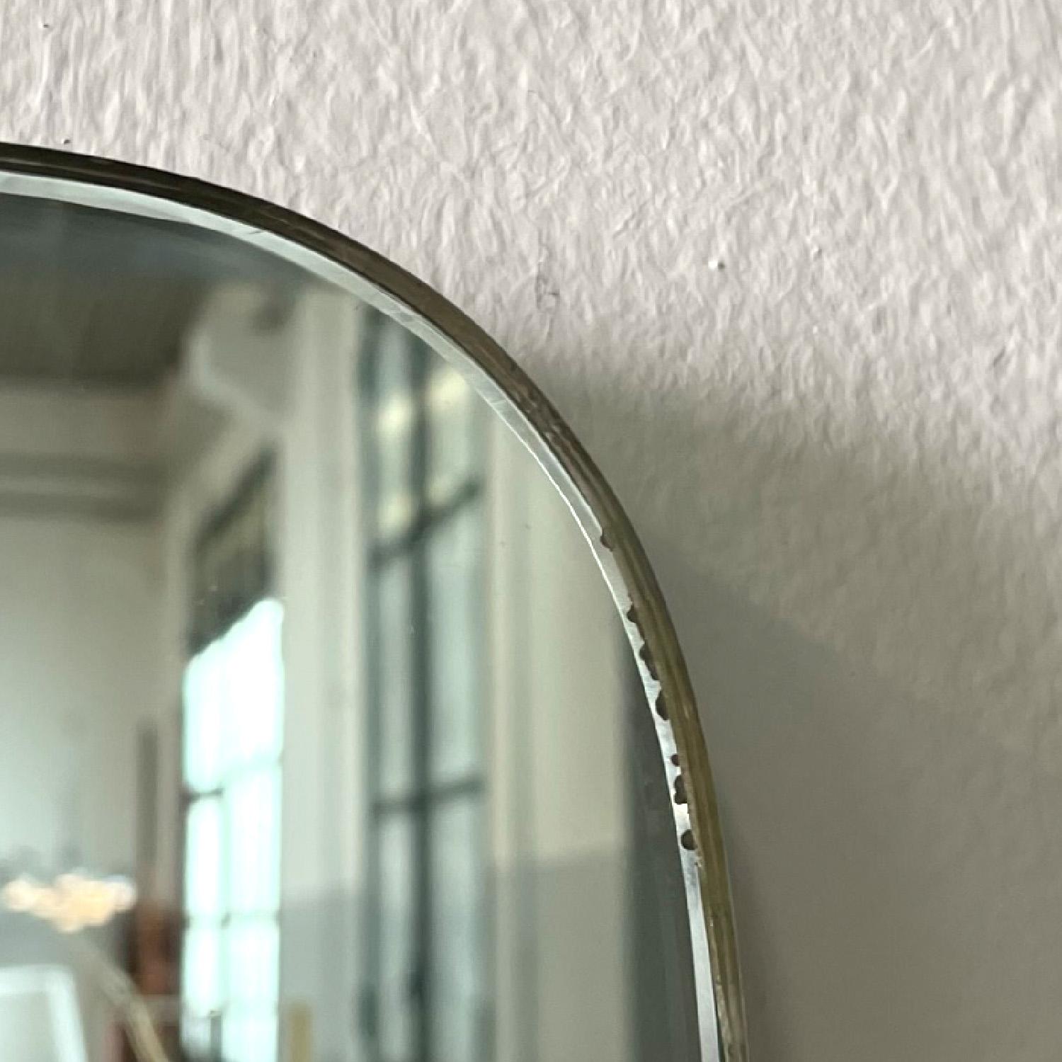 Italian mid-century modern wall mirror rounded shield shape brass details, 1960s 3