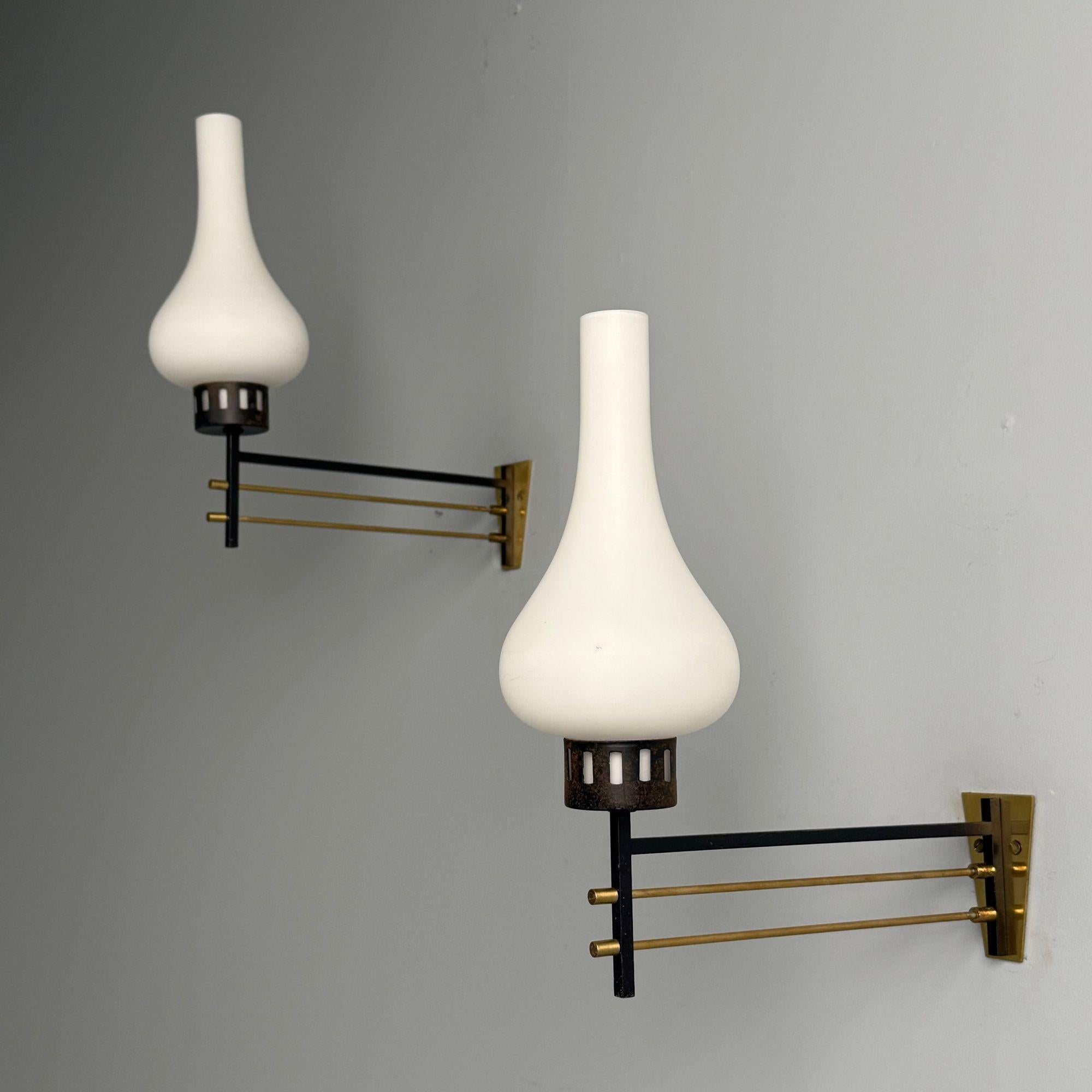 Italian Mid-Century Modern, Wall Sconces or Wall Lights, Patinated Brass, Opaline Glass, Italy, 1950s

This stunning pair of modernist Italian wall lights, designed and produced in Italy during the mid-20th century, exemplifies the charm and
