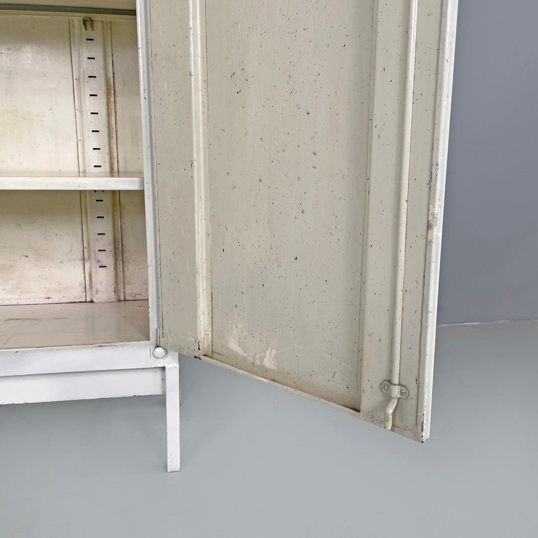 Italian mid-century modern white industrial bathroom two doors cabinet, 1960s For Sale 12