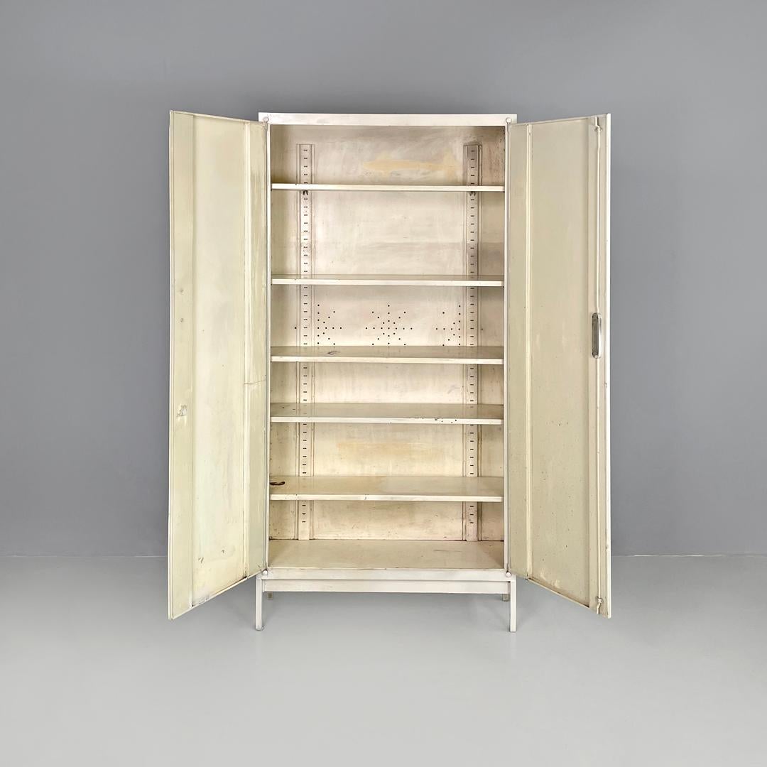 Mid-Century Modern Italian mid-century modern white industrial bathroom two doors cabinet, 1960s For Sale