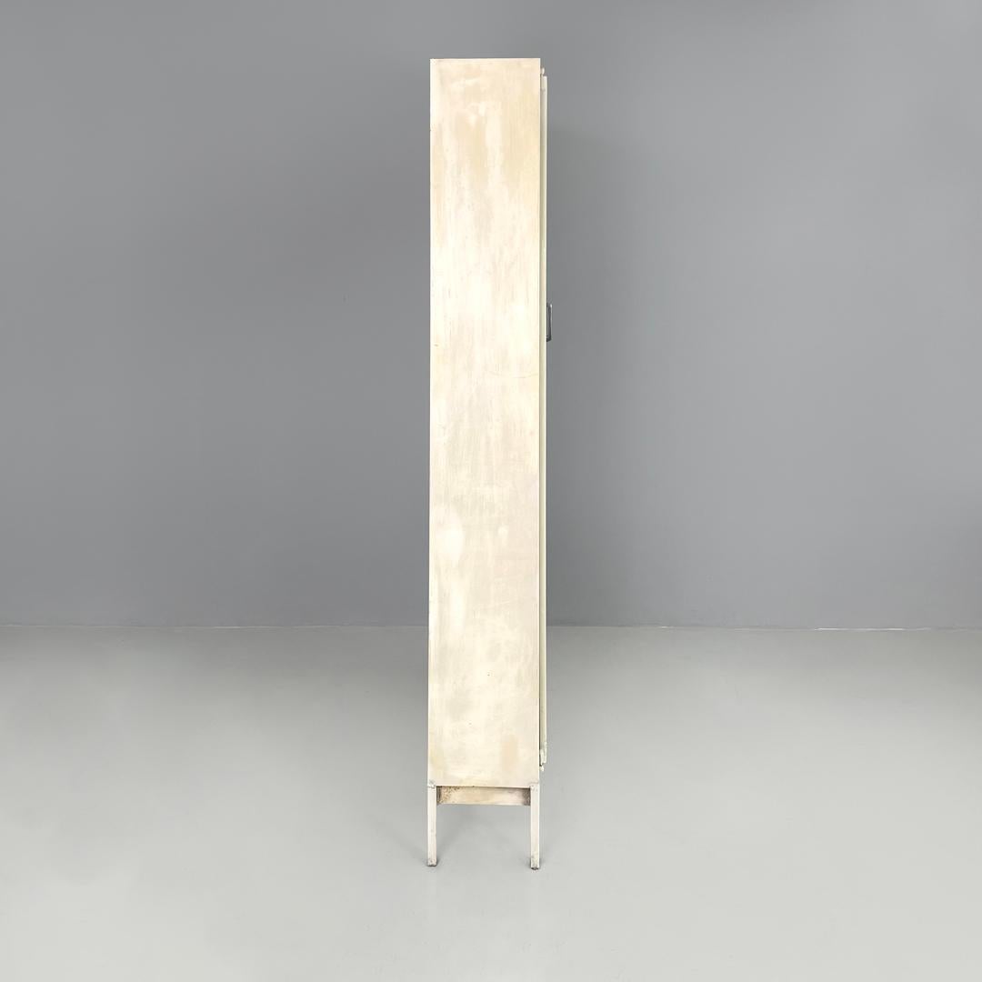 Italian mid-century modern white industrial bathroom two doors cabinet, 1960s For Sale 1