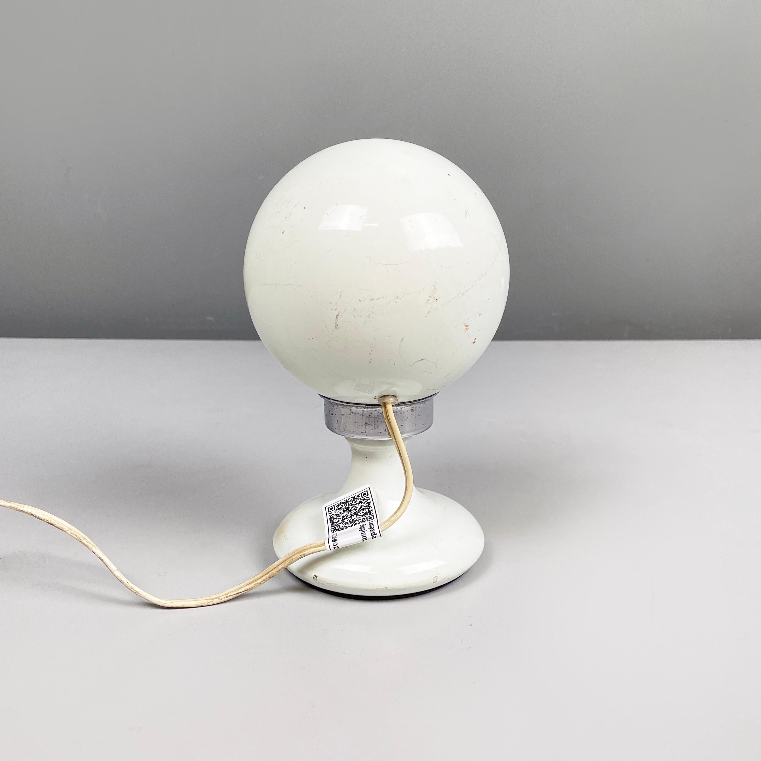Metal Italian mid-century modern white metal Adjustable table lamp by Reggiani, 1960s For Sale
