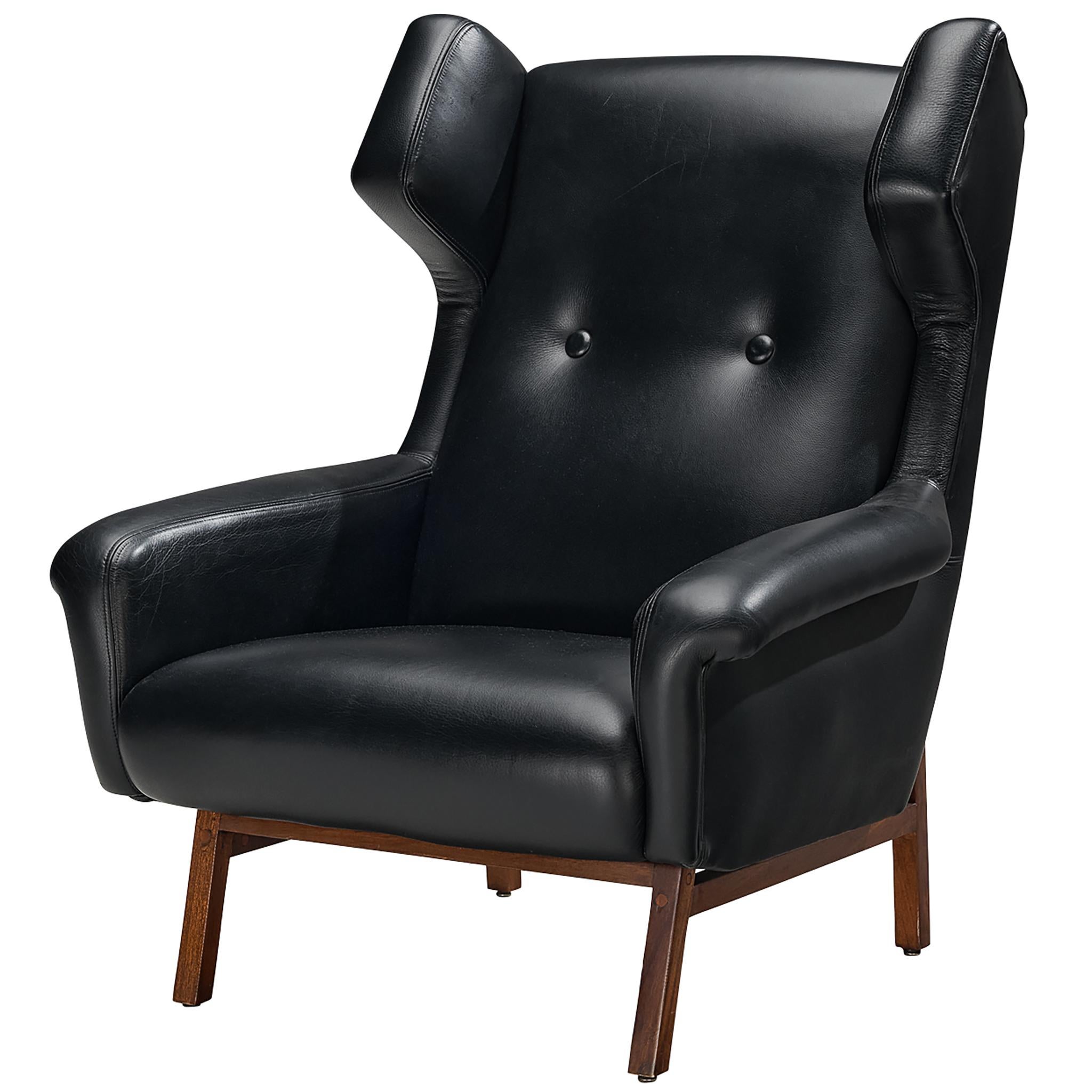 Italian Mid-Century Modern Wingback Lounge Chair in Black Leather and Mahogany
