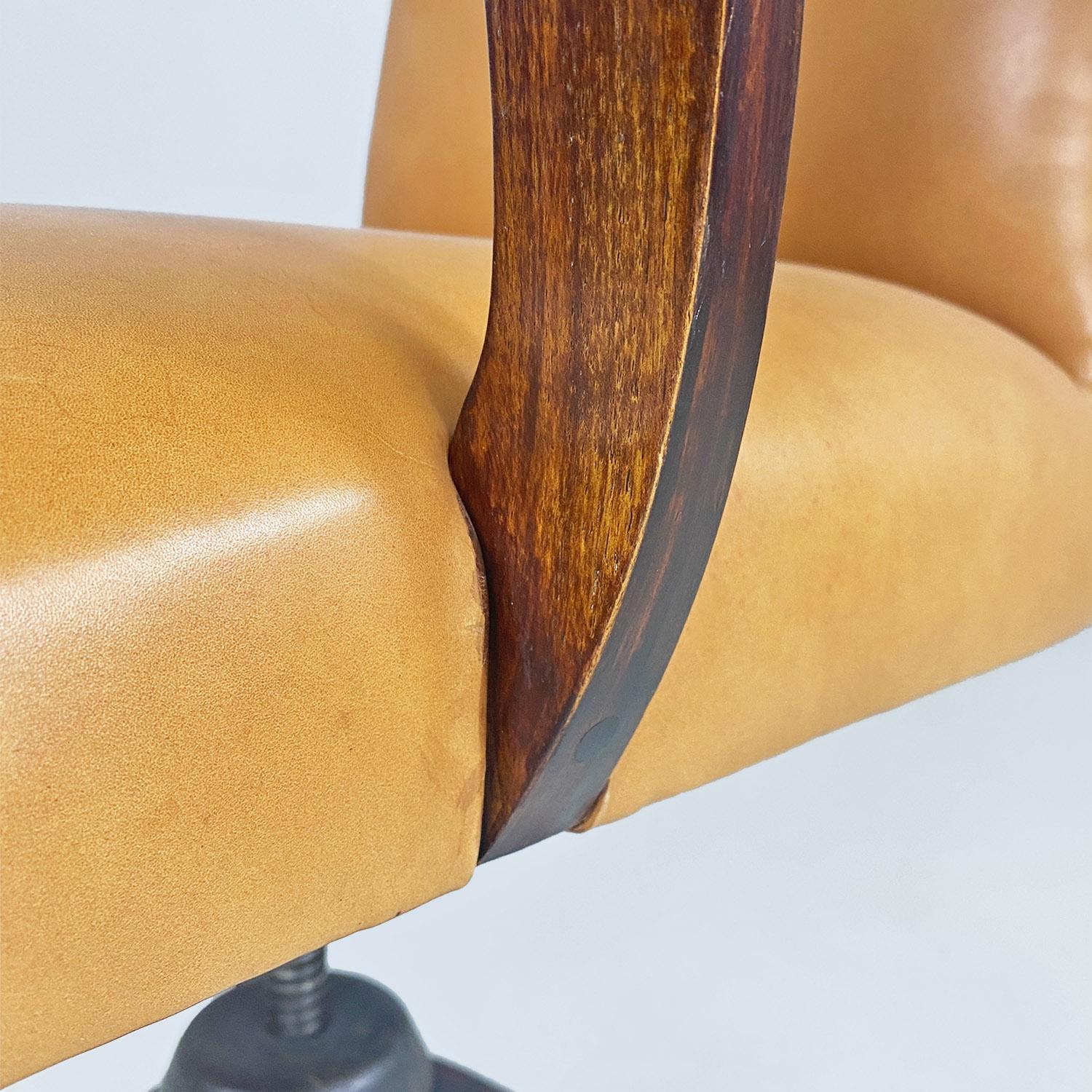 Italian mid-century modern wood and brown leather swivel office armchair, 1960s 5