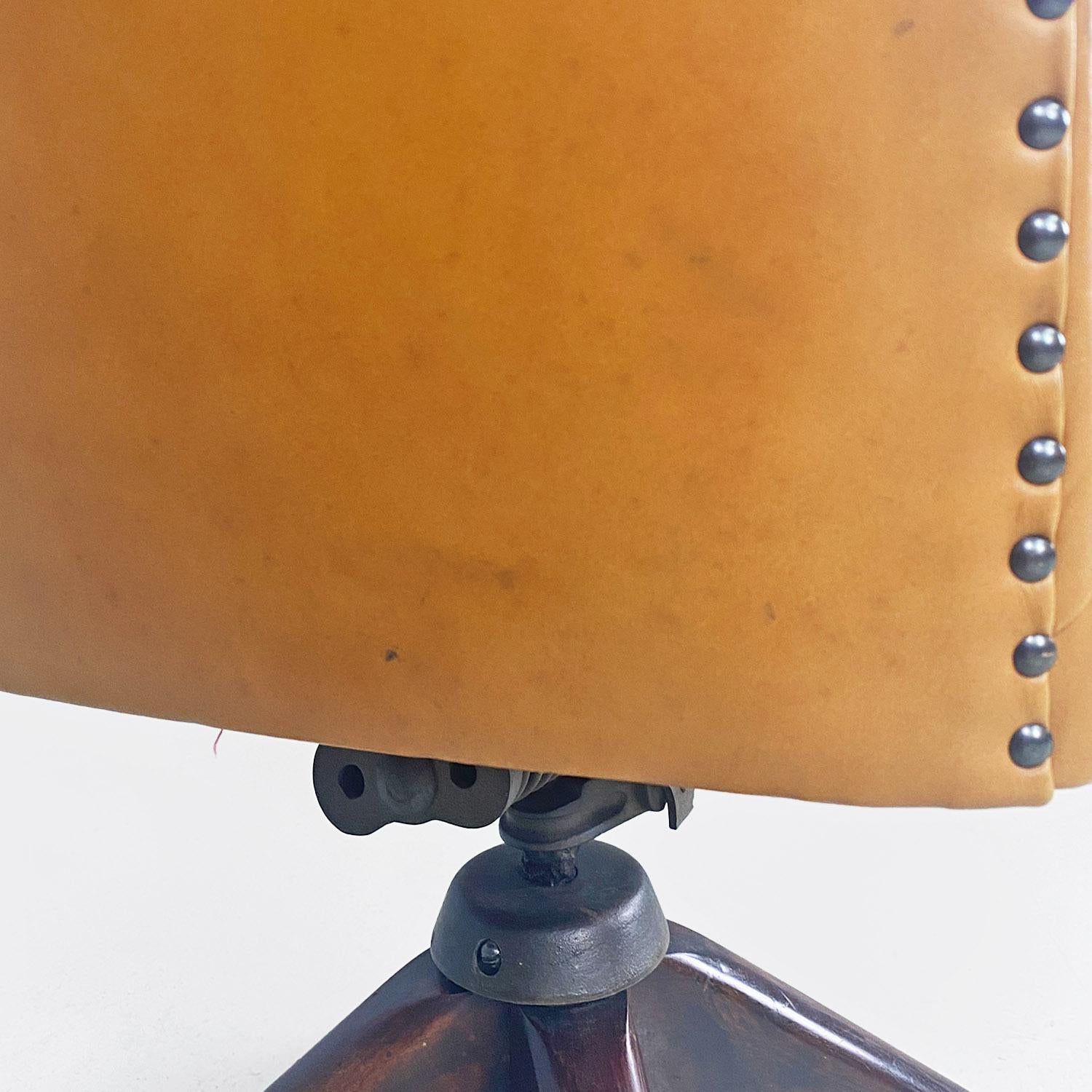 Italian mid-century modern wood and brown leather swivel office armchair, 1960s 9