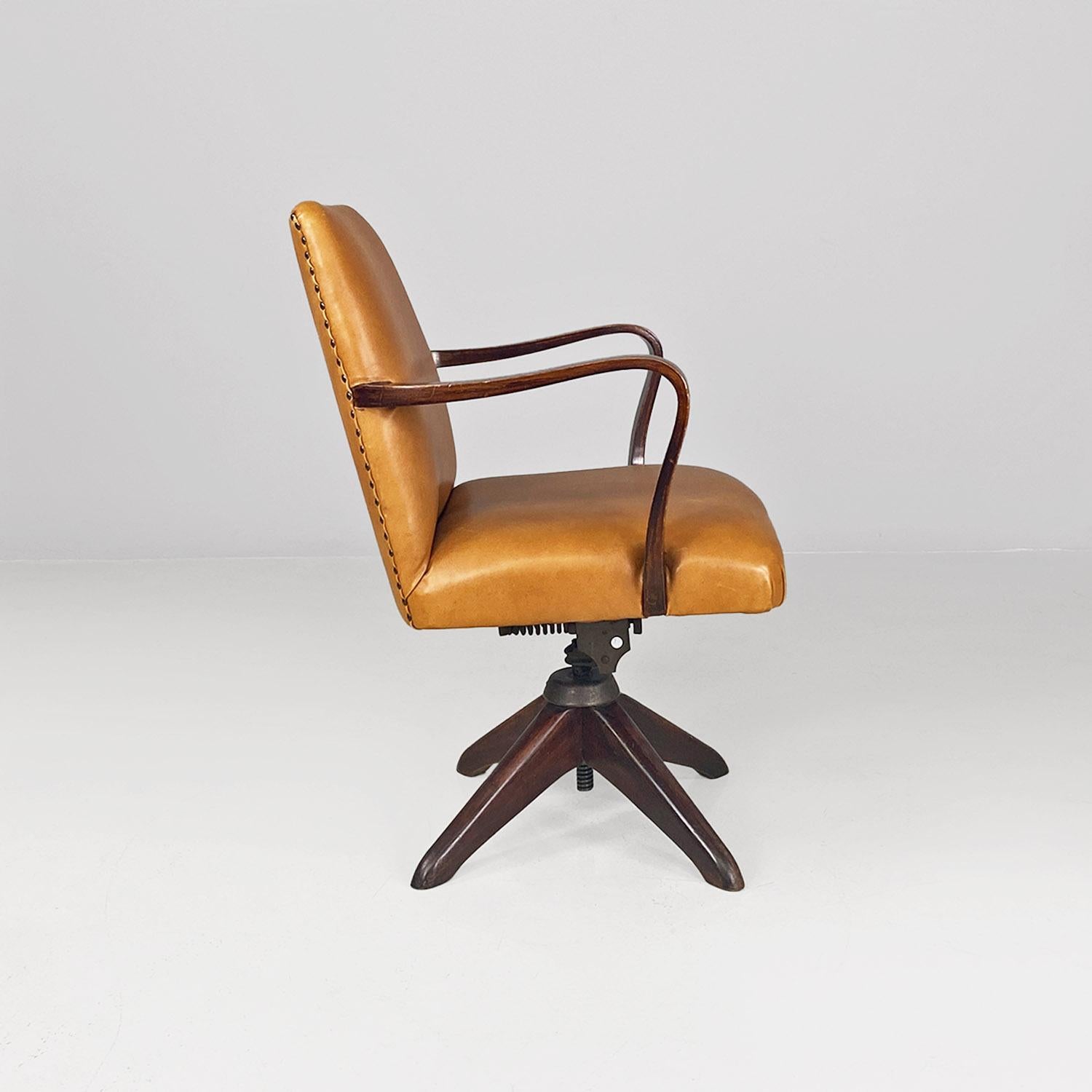 Mid-20th Century Italian mid-century modern wood and brown leather swivel office armchair, 1960s