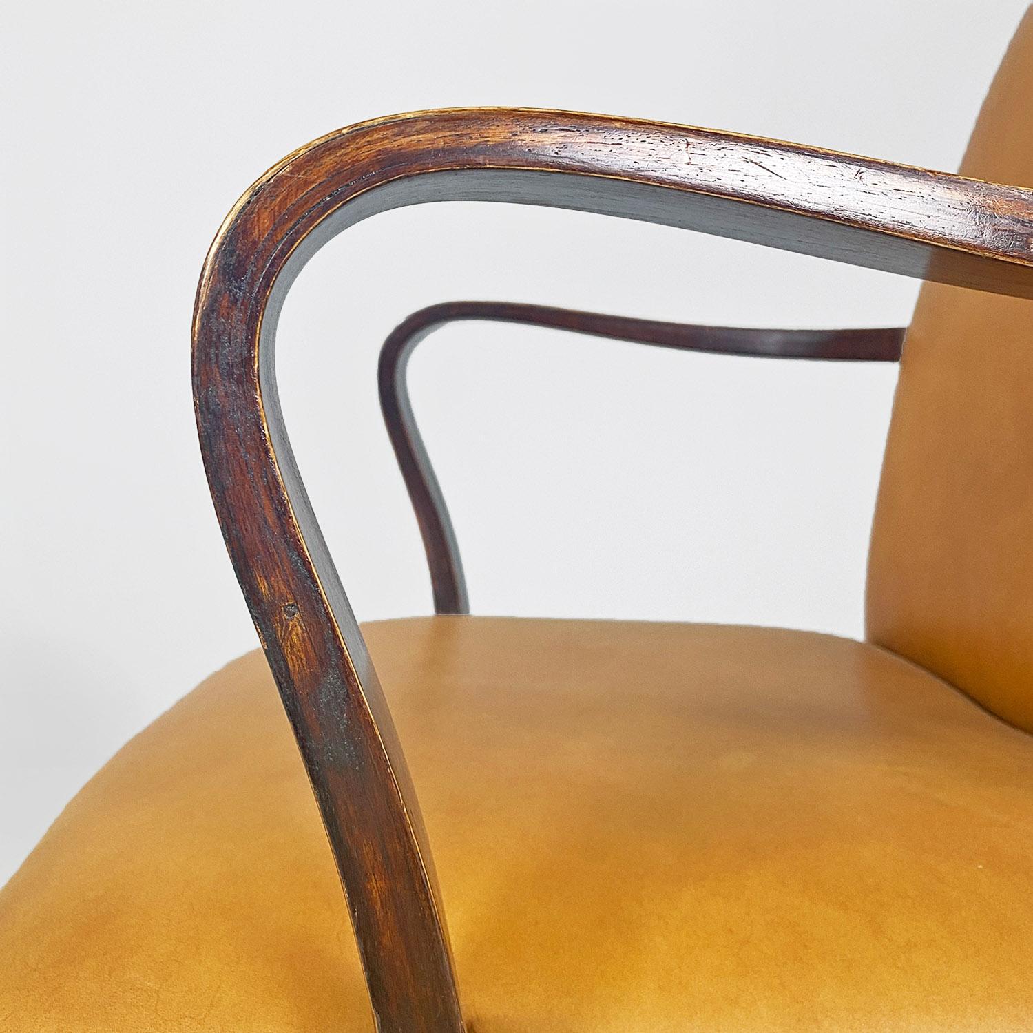 Italian mid-century modern wood and brown leather swivel office armchair, 1960s 1