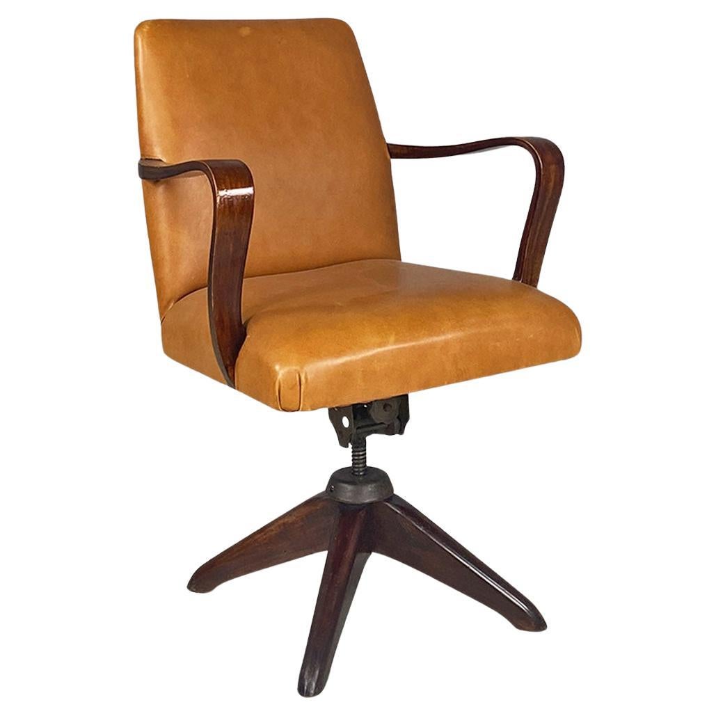 Italian mid-century modern wood and brown leather swivel office armchair, 1960s