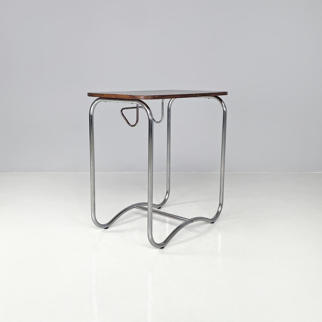 Italian mid-century modern wood and metal coffee table with newspaper hook 1950s In Fair Condition For Sale In MIlano, IT