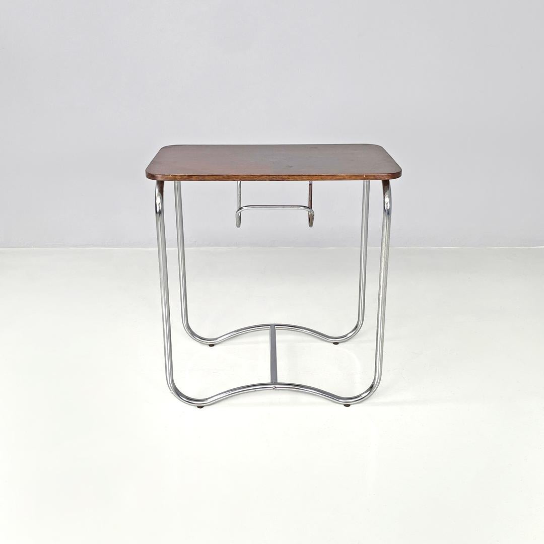 Metal Italian mid-century modern wood and metal coffee table with newspaper hook 1950s For Sale