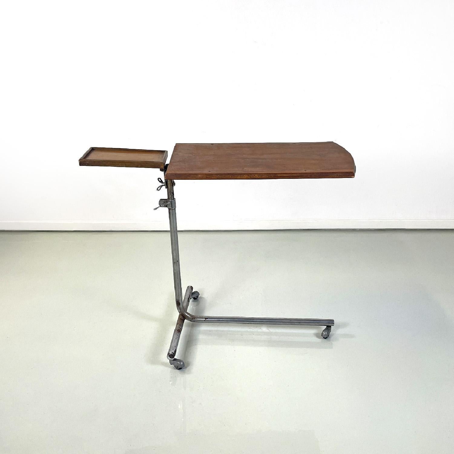 Italian mid-century modern wood and metal industrial work table, 1960s
Industrial work table with wooden top and small side tray top. The structure is made of tubular metal. The larger surface and the height of the table are directional and