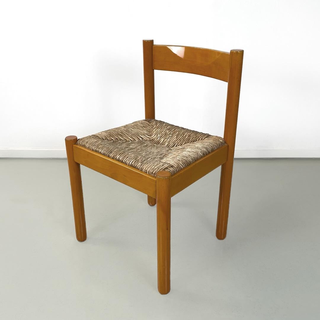 Italienische Stühle aus Holz und Korbgeflecht aus der Mitte des Jahrhunderts, 1960er Jahre.
Satz von 5 Stühlen aus Holz und Weide. Die quadratische Sitzfläche ist aus geflochtenem Rattan und die Holzbeine sind rund. Gelb lackierte Metallteile sind