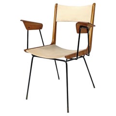 Used Italian mid-century modern wood black metal and beige leatherette chair, 1950s