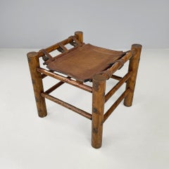 Italian mid-century modern wood stool and brown leather seat with straps, 1950s