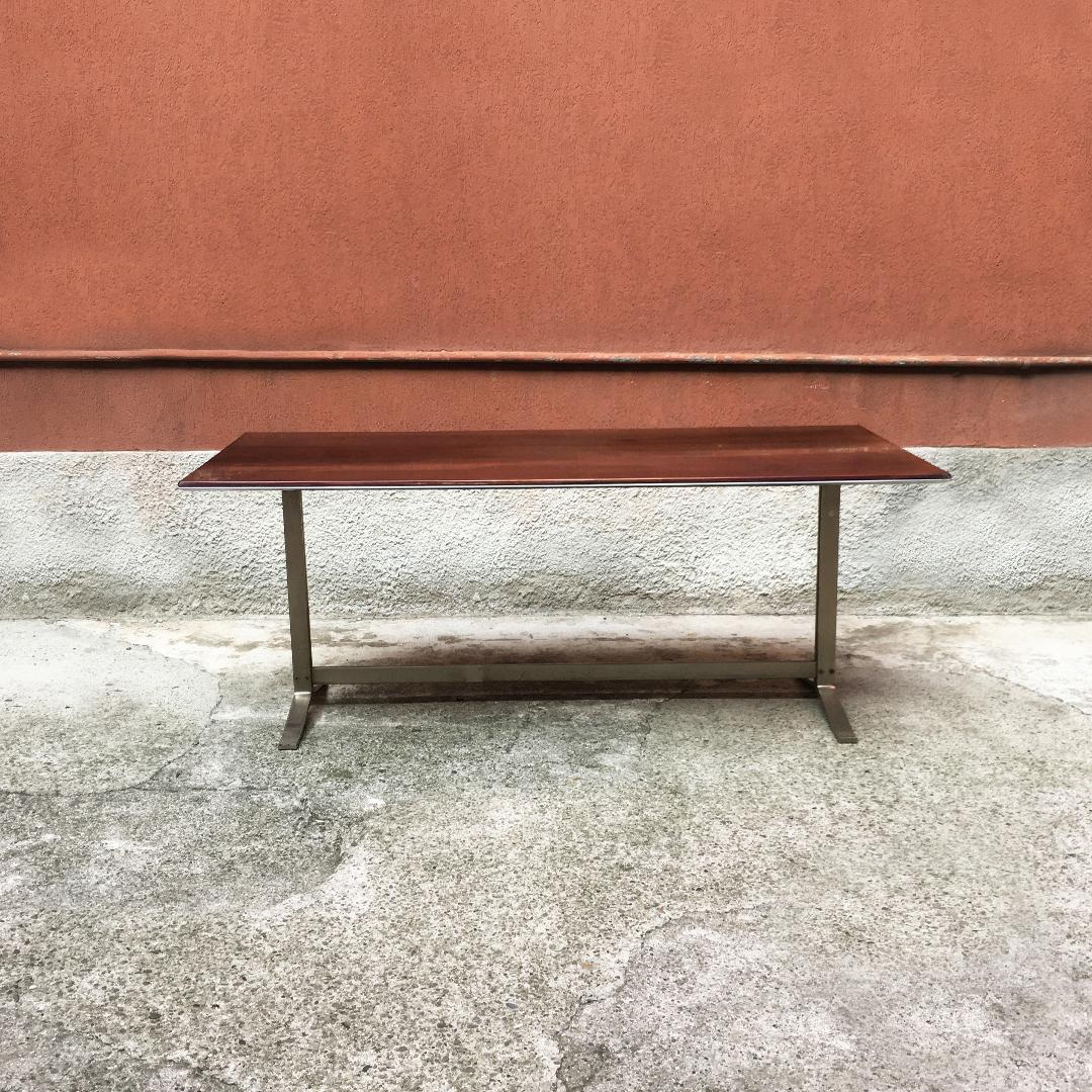 Italian Mid-Century Modern wood top and steel base desk table by Formanova, 1970s
Table desk with wood top with steel finish on the edge and solid steel structure with satin finish.
Produced by Formanova in the seventies.

Good general
