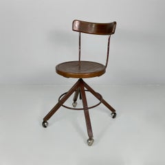 Italian mid-century modern wooden and metal chair with casters, 1940s