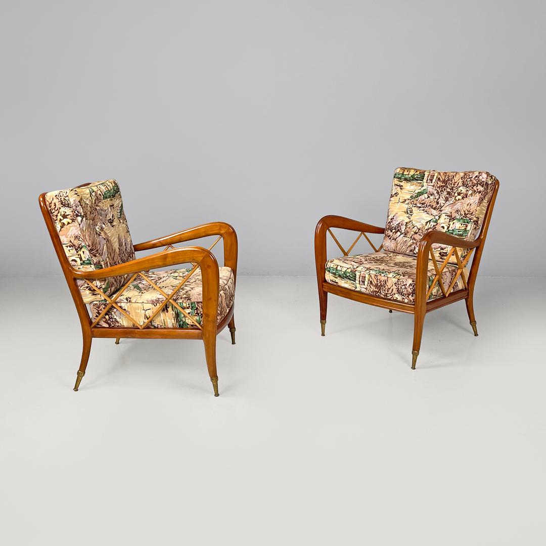 Italian mid-century modern wooden armchairs with brown decorated fabric, 1960s
Pair of wooden armchairs. The structure follows curved lines, between the armrests and the seat there are decorative 
